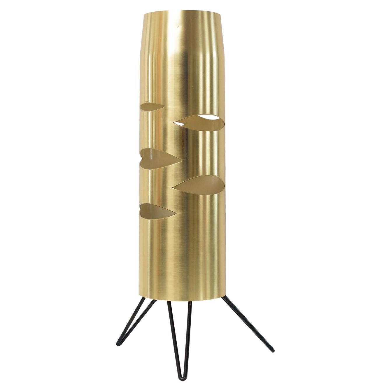 Scandinavian Modern Cylindrical Brass Lamp with Cutouts on a Tripod Base For Sale