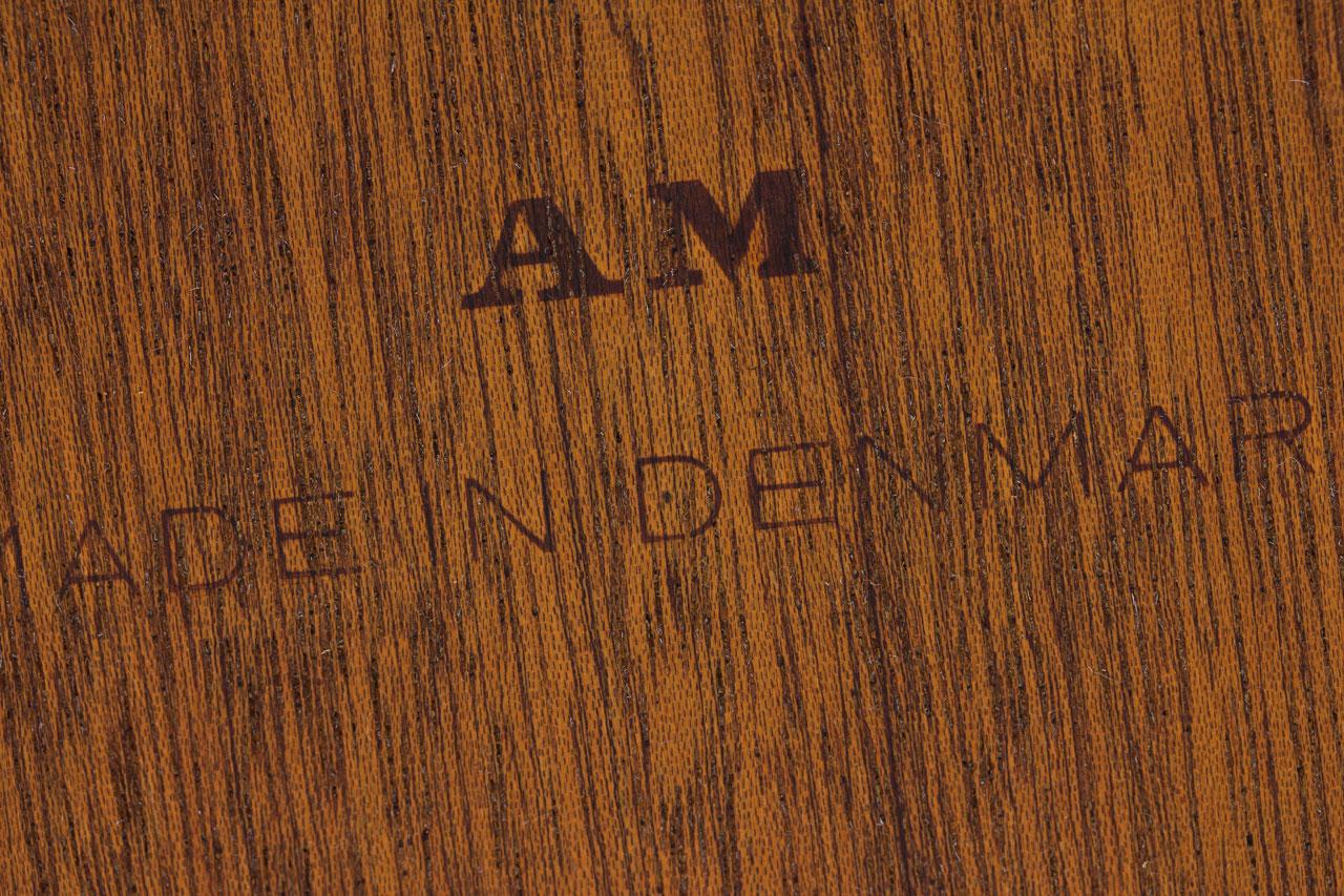 Scandinavian Modern Danish Teak Extendable Dining Table by Henning Kjærnulf 9