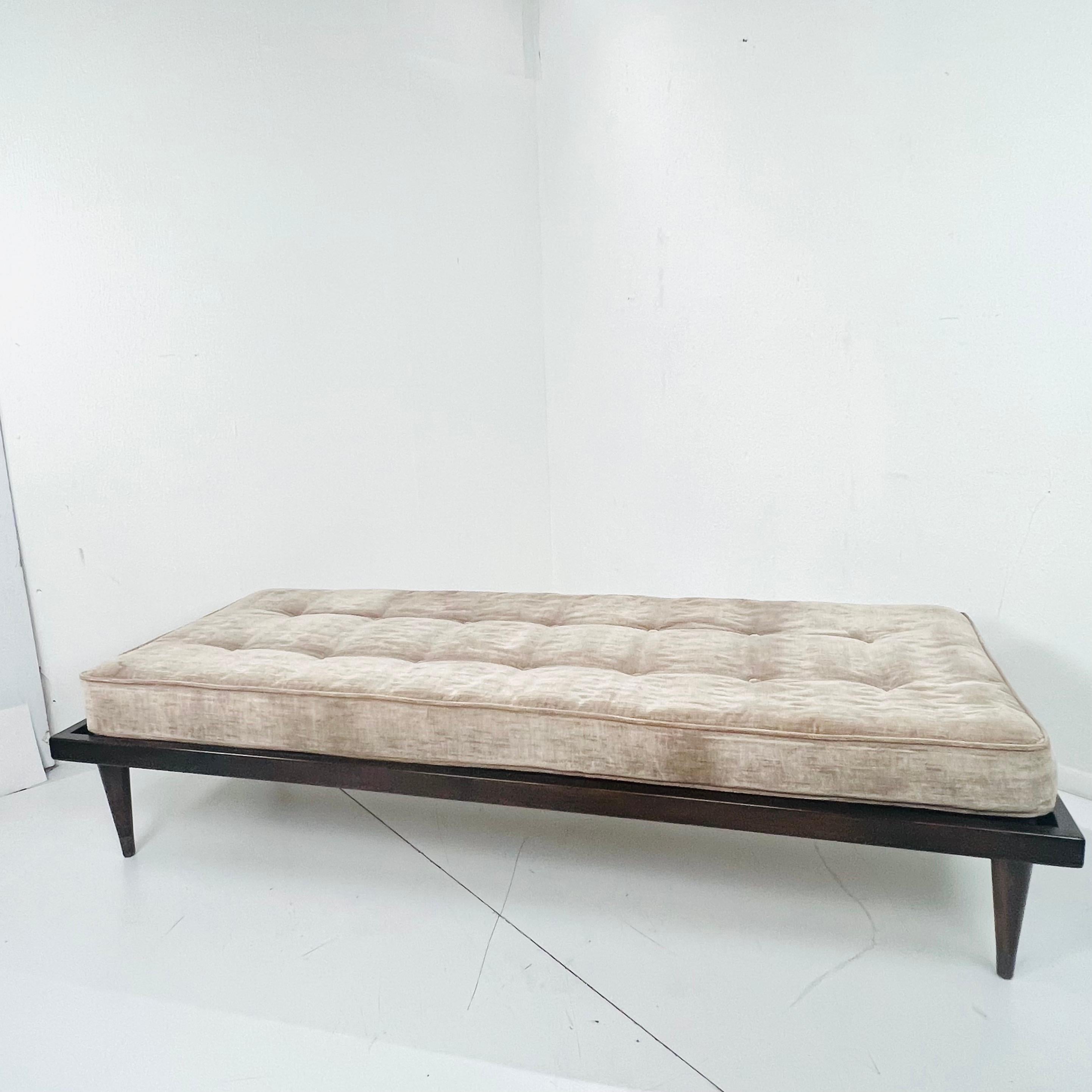 Simple and elegant vintage MCM daybed comprised of teak wood frame supporting a tufted upholstered cushion. Sturdy and in good vintage condition; cushion is stained on one side, reupholstery is recommended. 