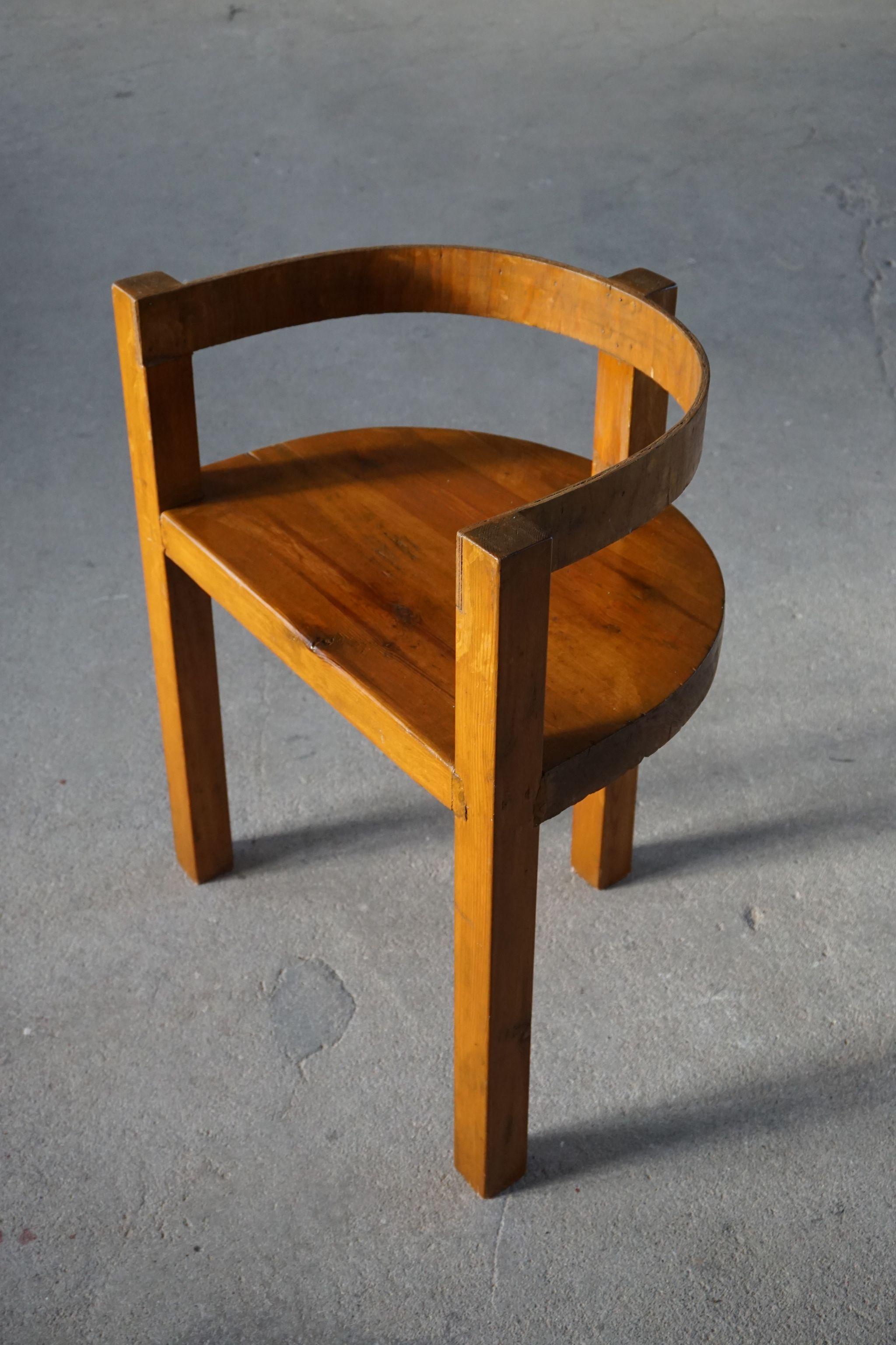 Decorative chair in pine, ca 1930s.
Made by a swedish cabinetmaker. 

Honorable mentions in similar style include Roland Wilhelmsson, Pierre Chapo, and Axel Einar Hjorth.