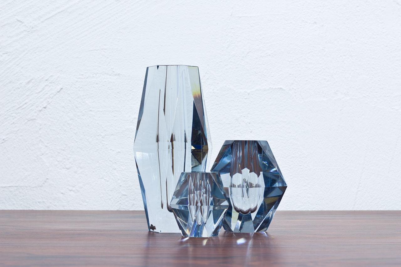 Group of three diamond cut crystal vases. Designed by Asta Strömberg for Strömbergshyttan in Sweden during the 1960s. Two labeled and one engraved on bottom.
Dimensions H 8.5 / 12.5 / 23 x W 9 / 13 / 12 x D 8 / 11.5 / 10.5cm.