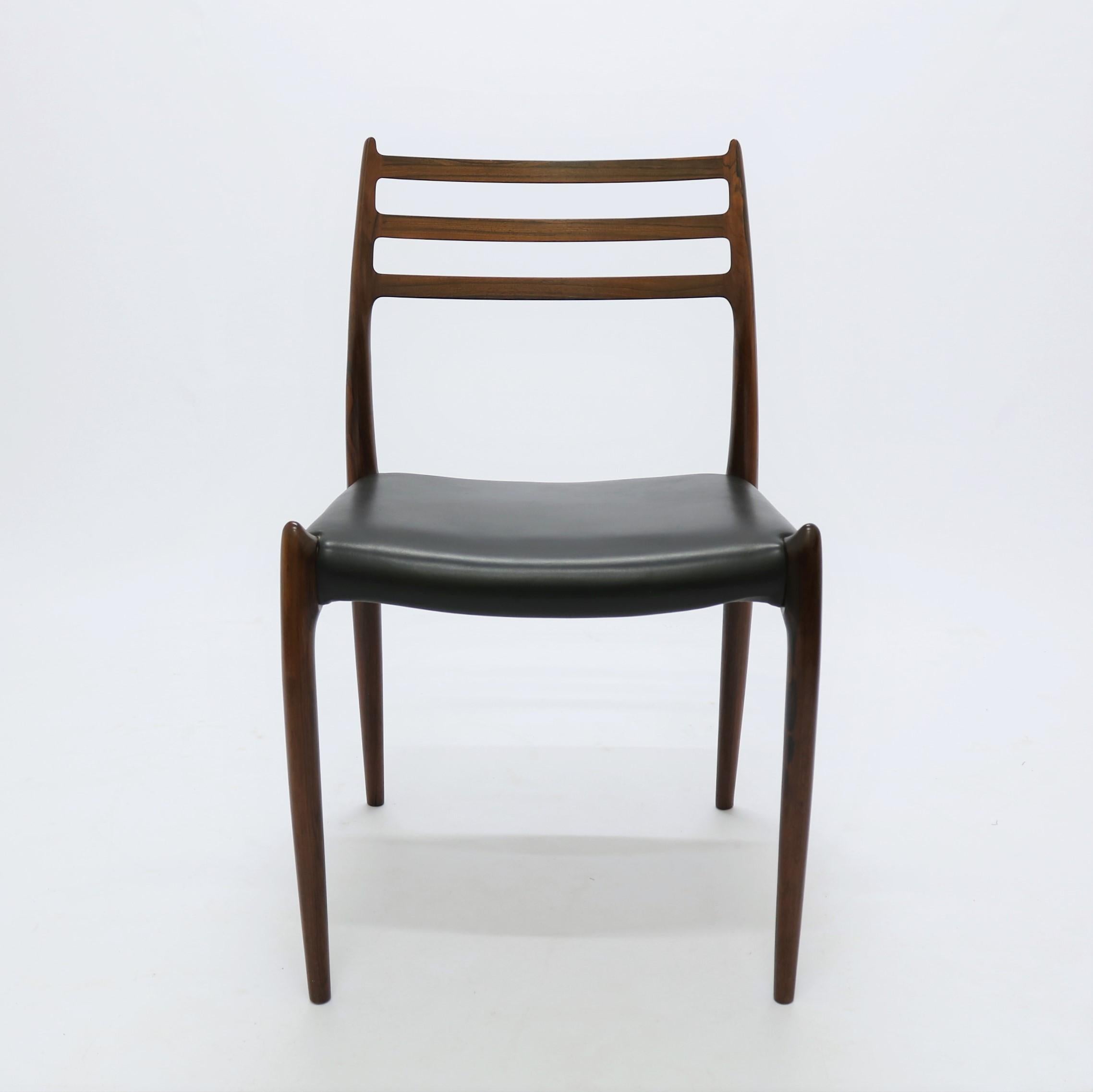 N.O. Moller, 10 Dining Chairs in Rosewood and Black Leather, Scandinavian Modern 1