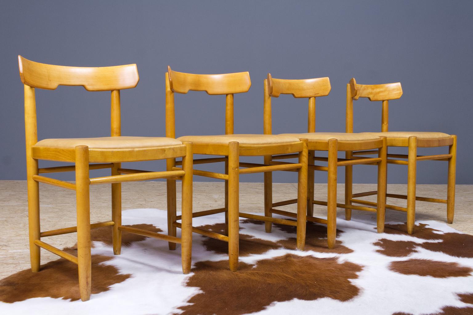 Scandinavian Modern re-upholstered set of 4 beech dining chairs, Danish origin possibly Farstrup. The set is reupholstered in a excellent quality leather, tan colored. No instabilities, great construction of the frames are checked, restored and