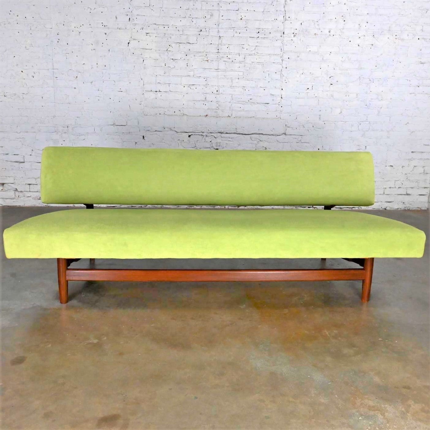 Stunning vintage Scandinavian Modern Dutch midcentury sofa attributed to Doublet Sofa by Rob Parry for Gelderland. It is made in Holland and comprised of a rosewood frame & stretcher with chartreuse green brushed chenille fabric. This piece has been