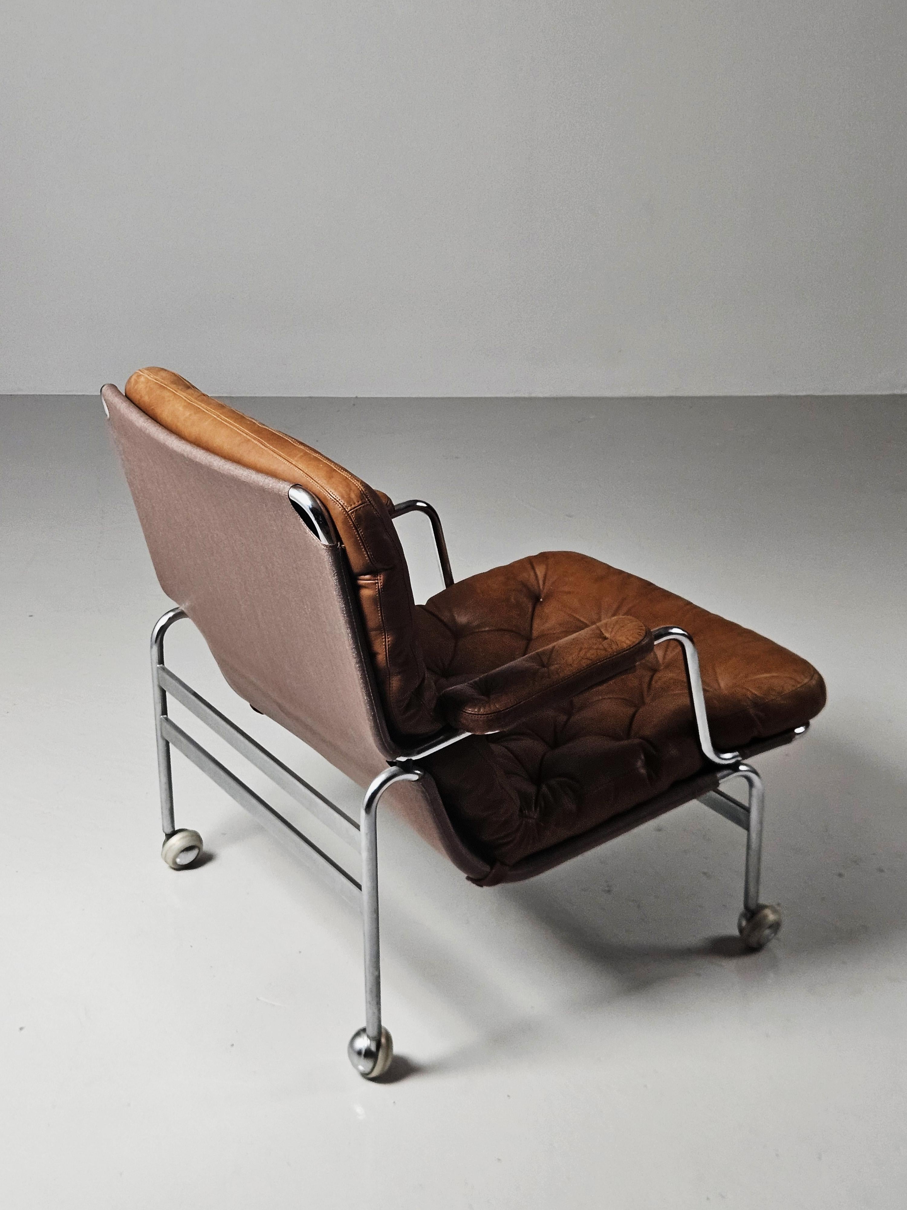 Steel Scandinavian modern easy chairs 'Karin' by Bruno Mathsson, Sweden, 1970s