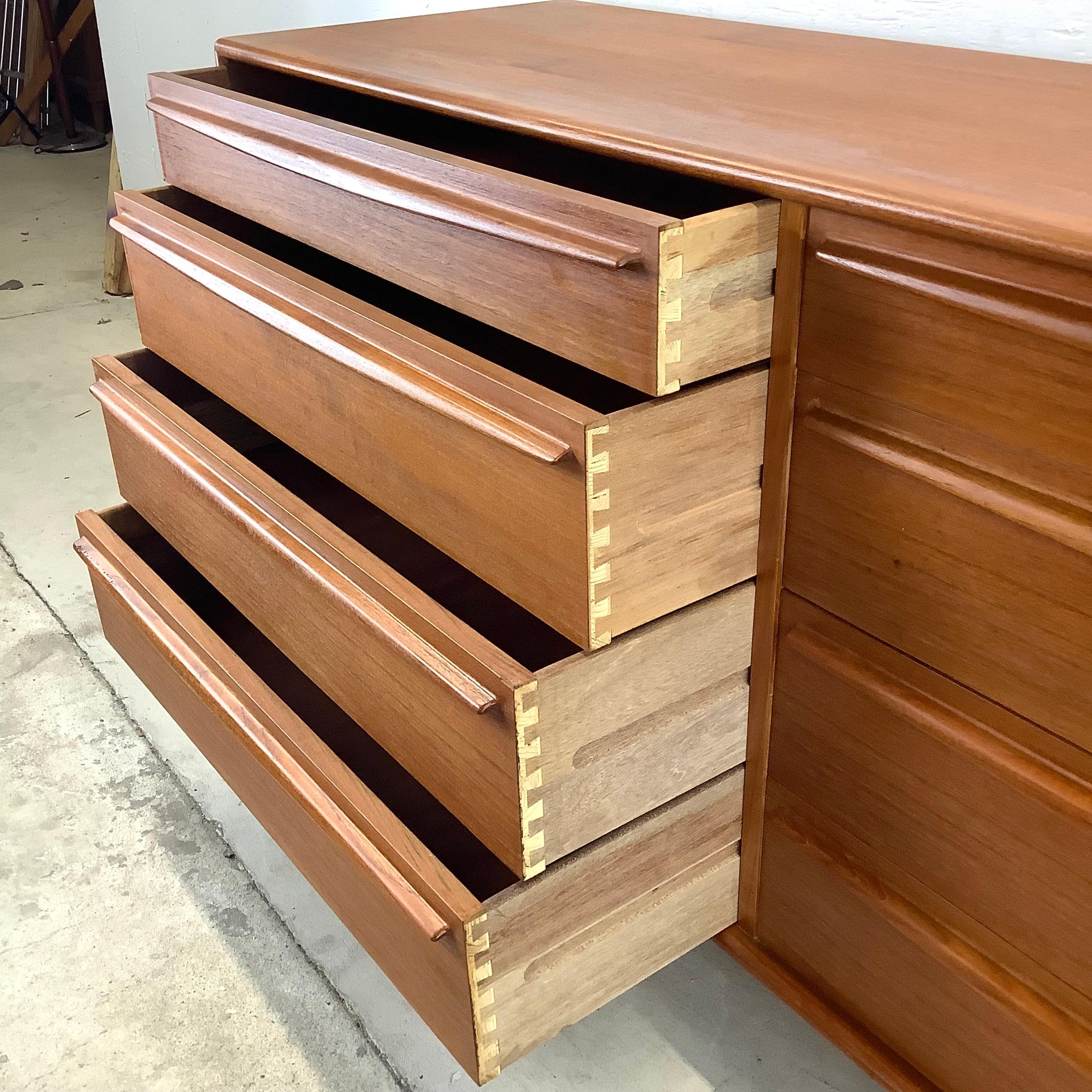 Scandinavian Modern Eight Drawer Teak Dresser by Lyby Møbler 11