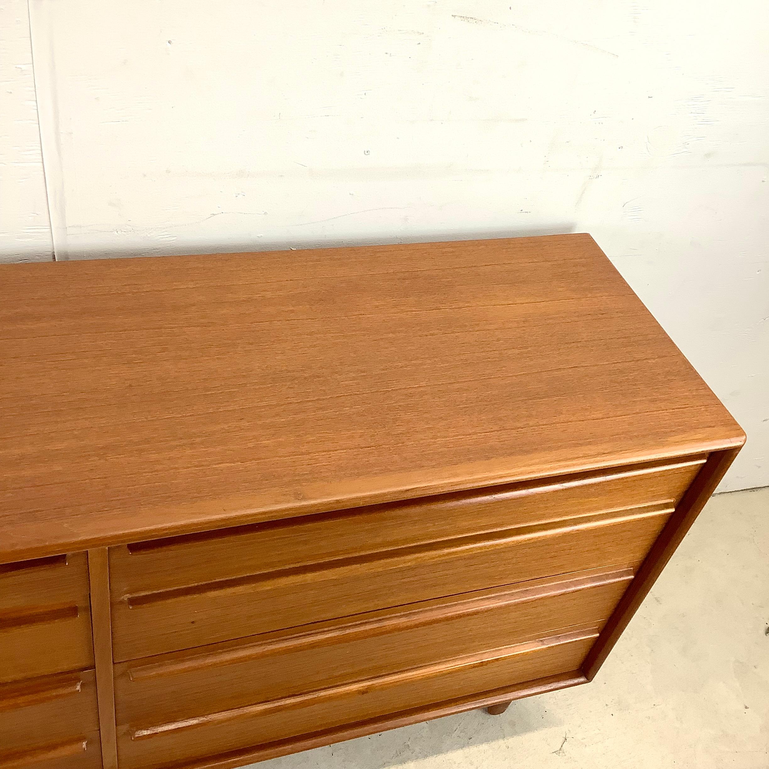Wood Scandinavian Modern Eight Drawer Teak Dresser by Lyby Møbler