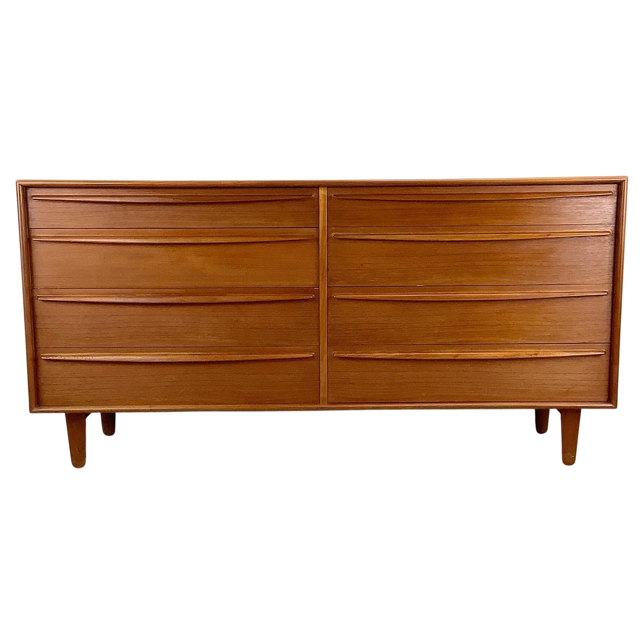 Scandinavian Modern Eight Drawer Teak Dresser by Lyby Møbler