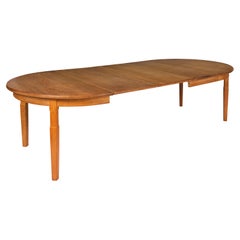 Retro  Scandinavian Modern Extendable Oval Oak Dining Table by Henning Kjaernulf