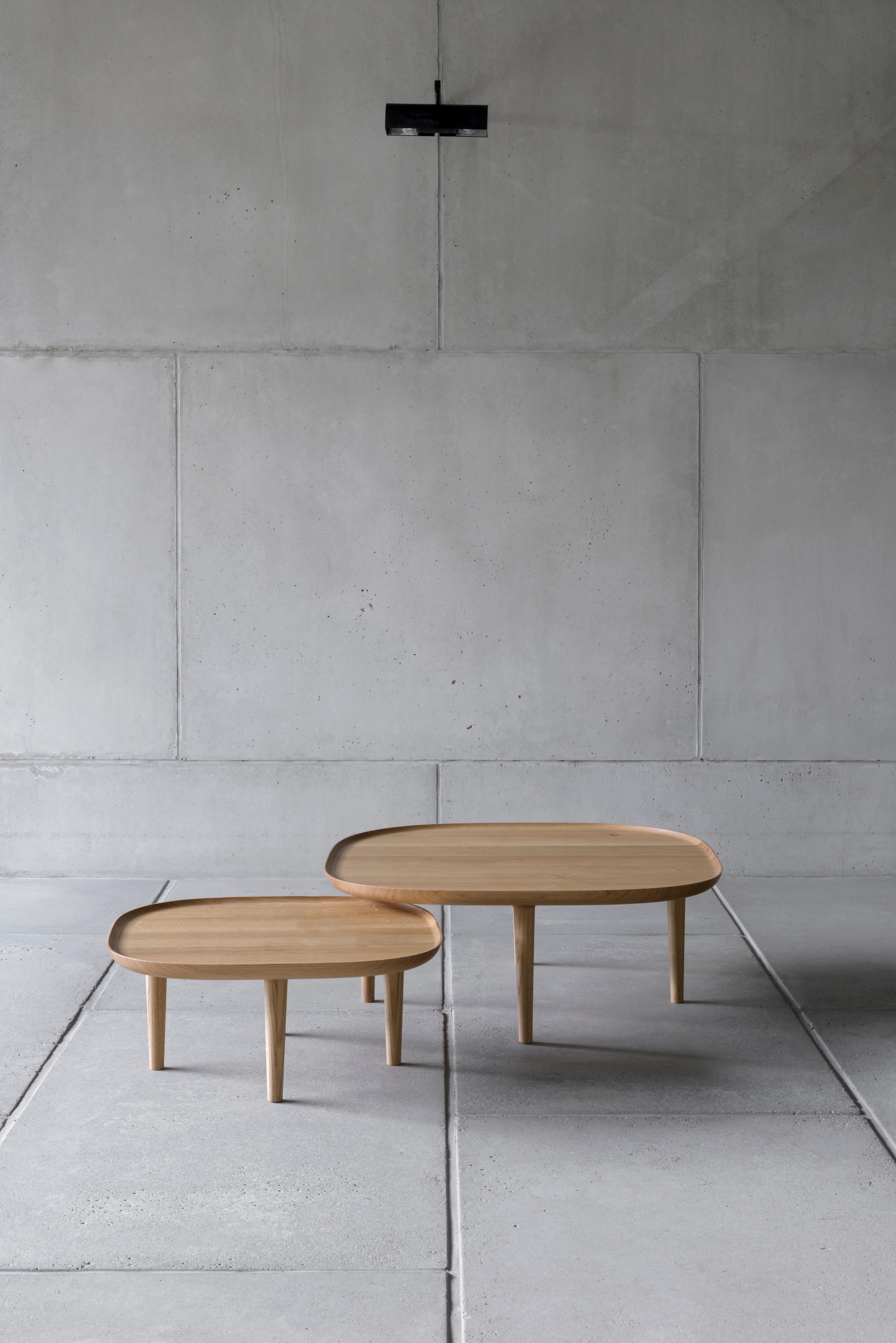 Fiori Table 65 designed by Antrei Hartikainen x Poiat
Fiori Collection 2017

Available finishes: 
- Oak
- Dark oak 
- Black oak

Model shown in picture : 
- H. 30 x 65 x 65 cm
- Oak

Designed by Poiat Studio in collaboration with the