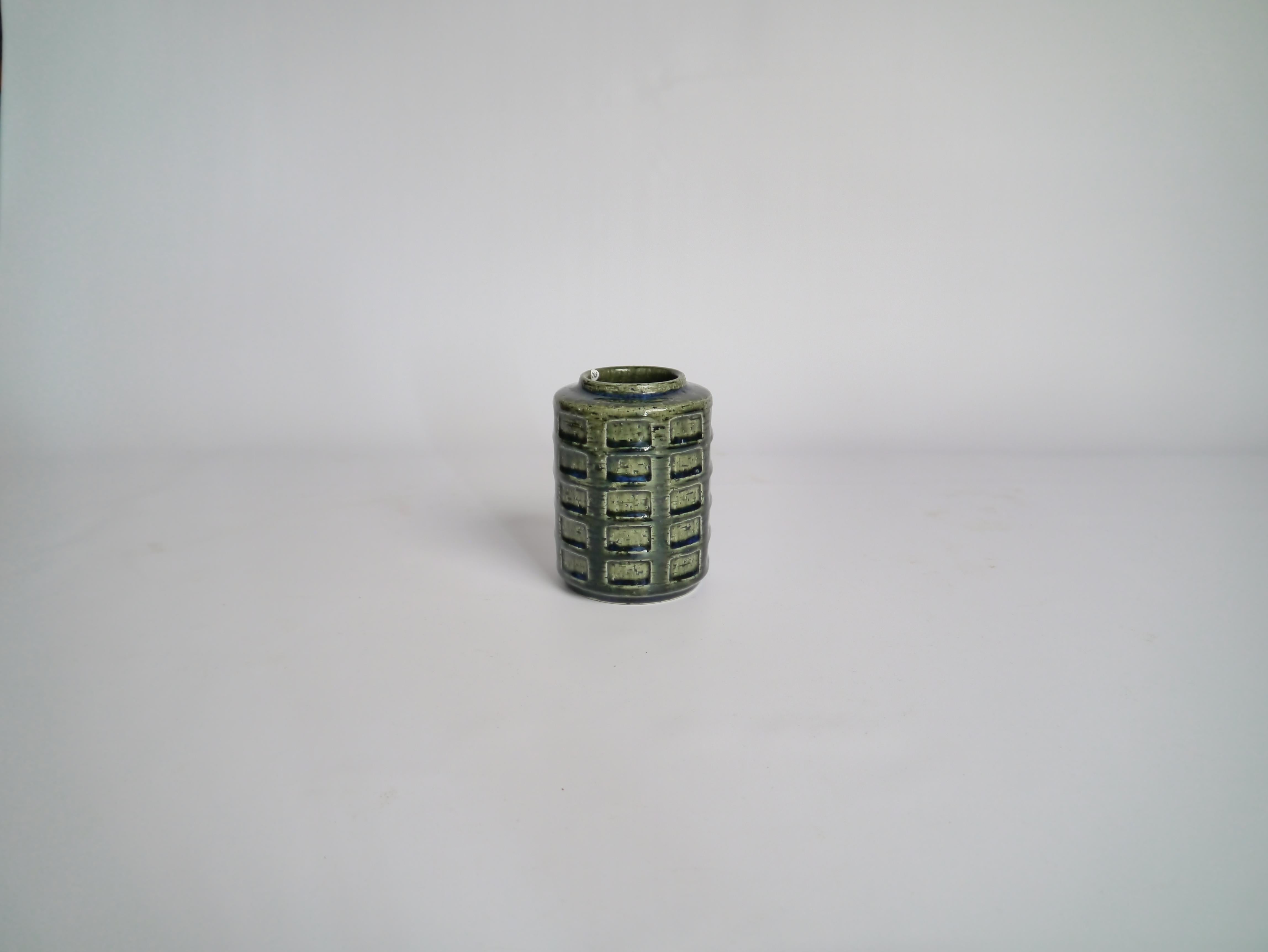 Glazed ceramic vase designed by Annelise and Per Linemann-Schmidt for Palshus, Denmark, 1960s. Rich shiny green-blue glaze & clean and repetitive architectonic pattern makes this little vase an eyecatcher.