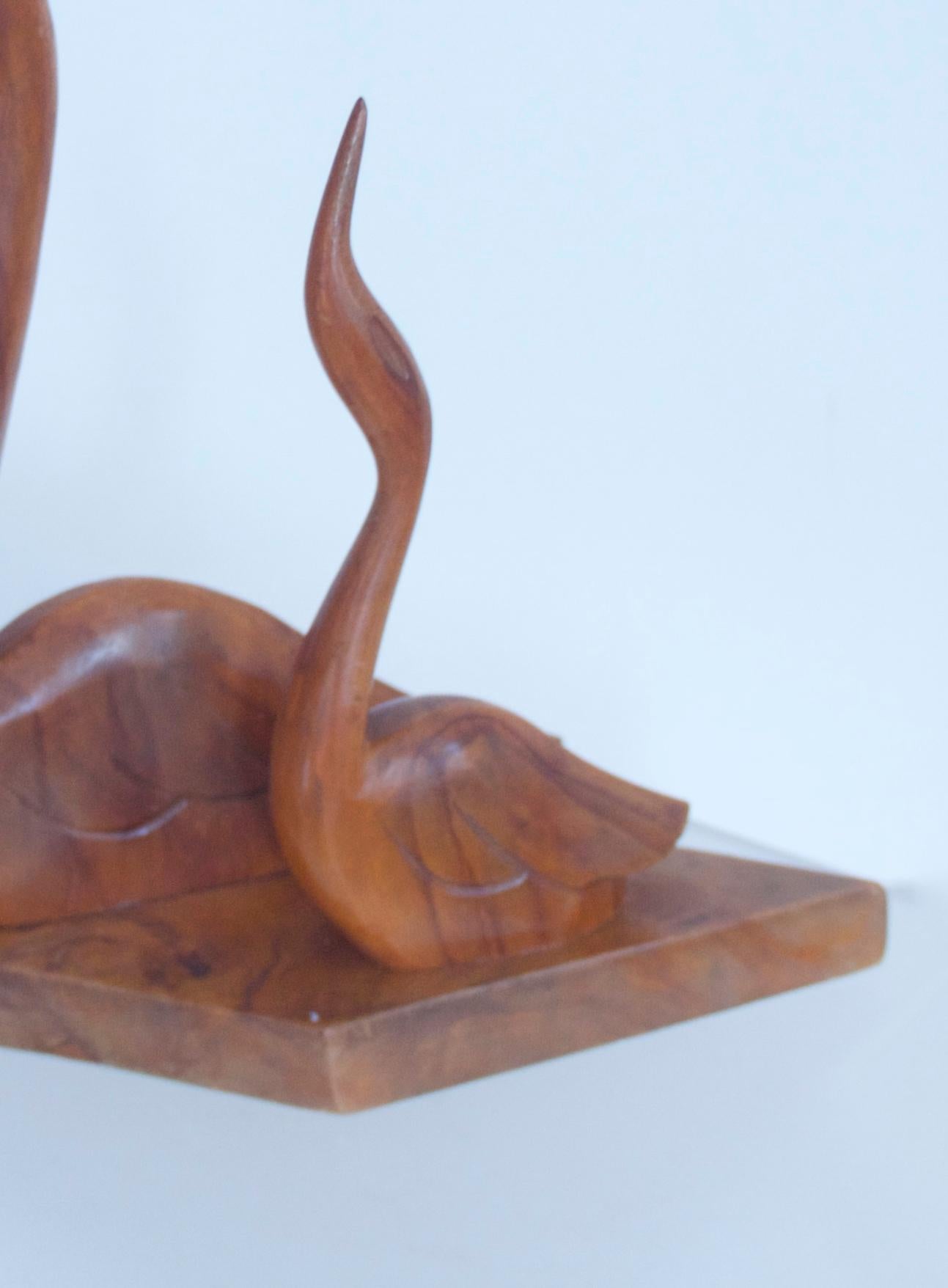 Scandinavian Modern hand carved sculpture - Pair of swans 1955 in polished teak typical of the figurative style of the mid-1950s

Measures: Height 20 cms, length 20 cms 
Weight 0.220 kgs.

 
