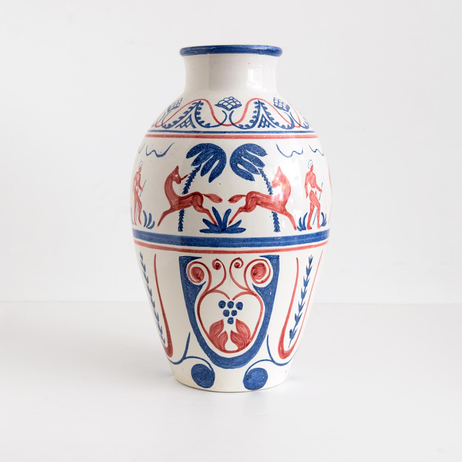 Hand painted figurative ceramic vase on a cream white glazed body, dated 1946. From Hank Keramikk Verksted, Oslo, Norway signed “NK”.

Measures: Height 16”, diameter 10”.