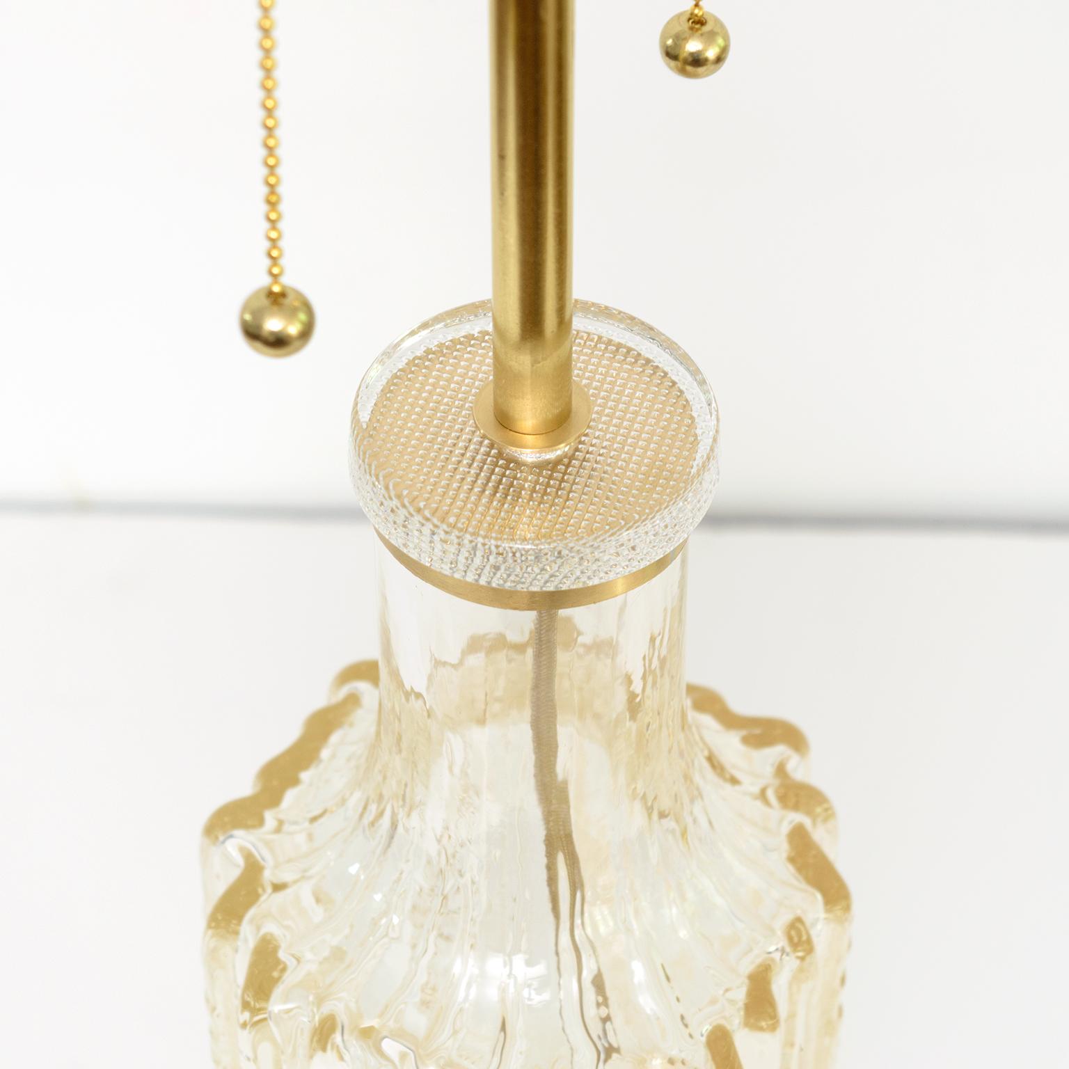 20th Century Scandinavian Modern Highly Textured Clear Glass Table Lamp with Brass Details For Sale