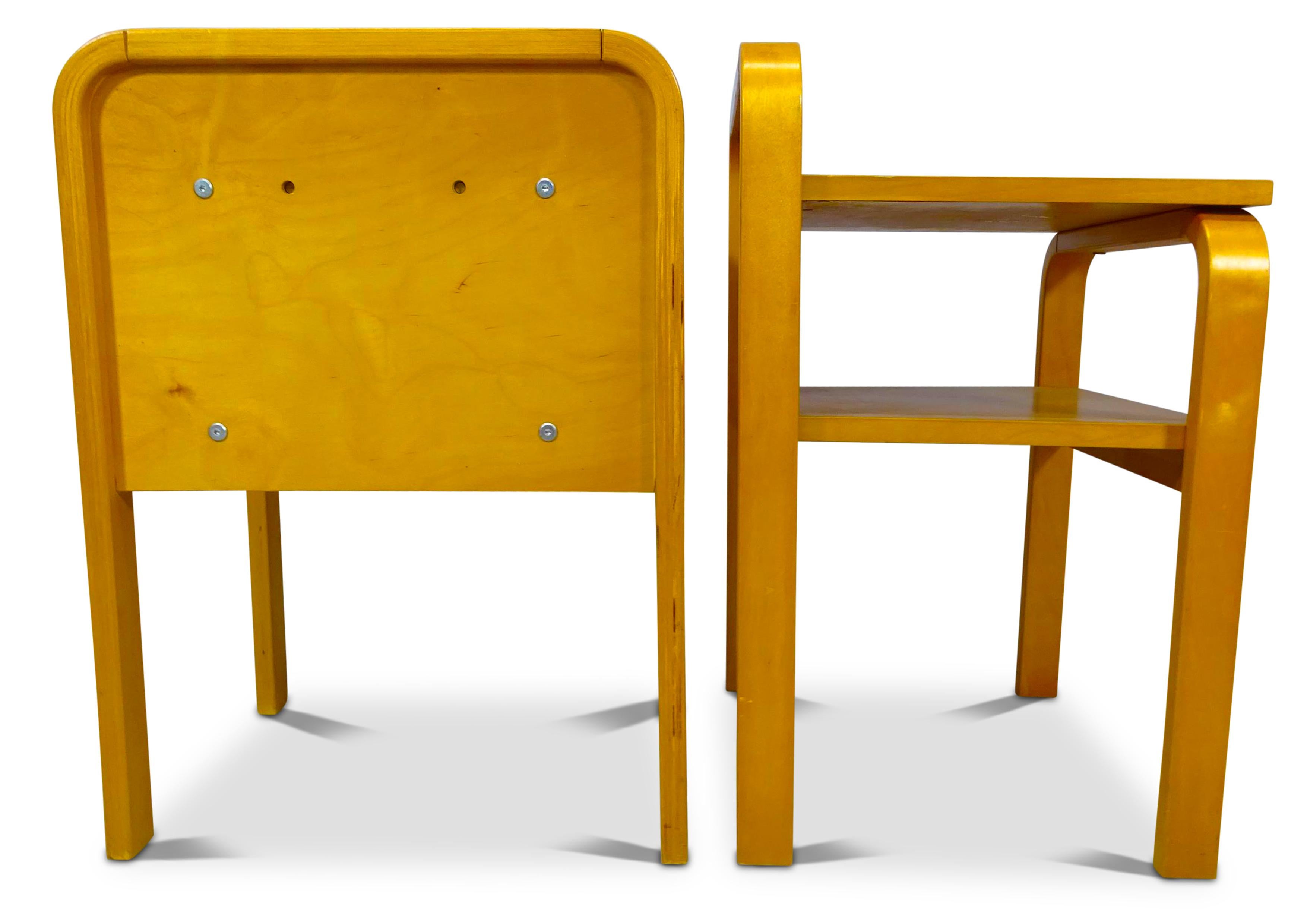 A beautiful pair of original Isku Oy of Finland, Scandinavian Modern, bent plywood birch bedside tables with maker's labels 1980s. In the style of Alvar Aalto.

Finding inspiration in Finnish forests, in pure raw materials, using environmentally