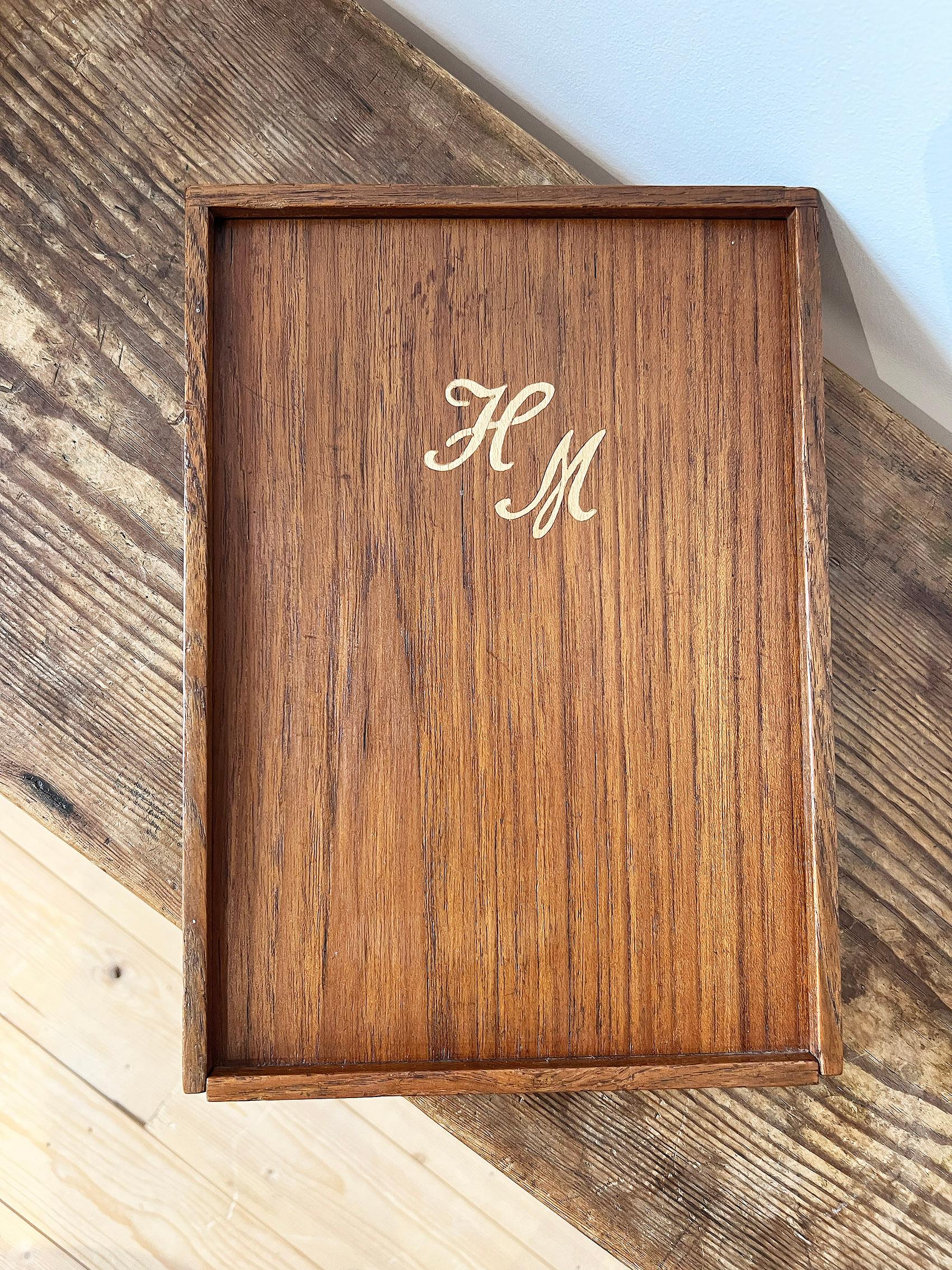 Beautiful jewelry box in teak and leather. Inscription HM on top, ca 1950-1960's. Unknown designer and maker. 

Good vintage condition, wear and patina consistent with age and use. Scratches on the leather with a smaller damage as seen on the