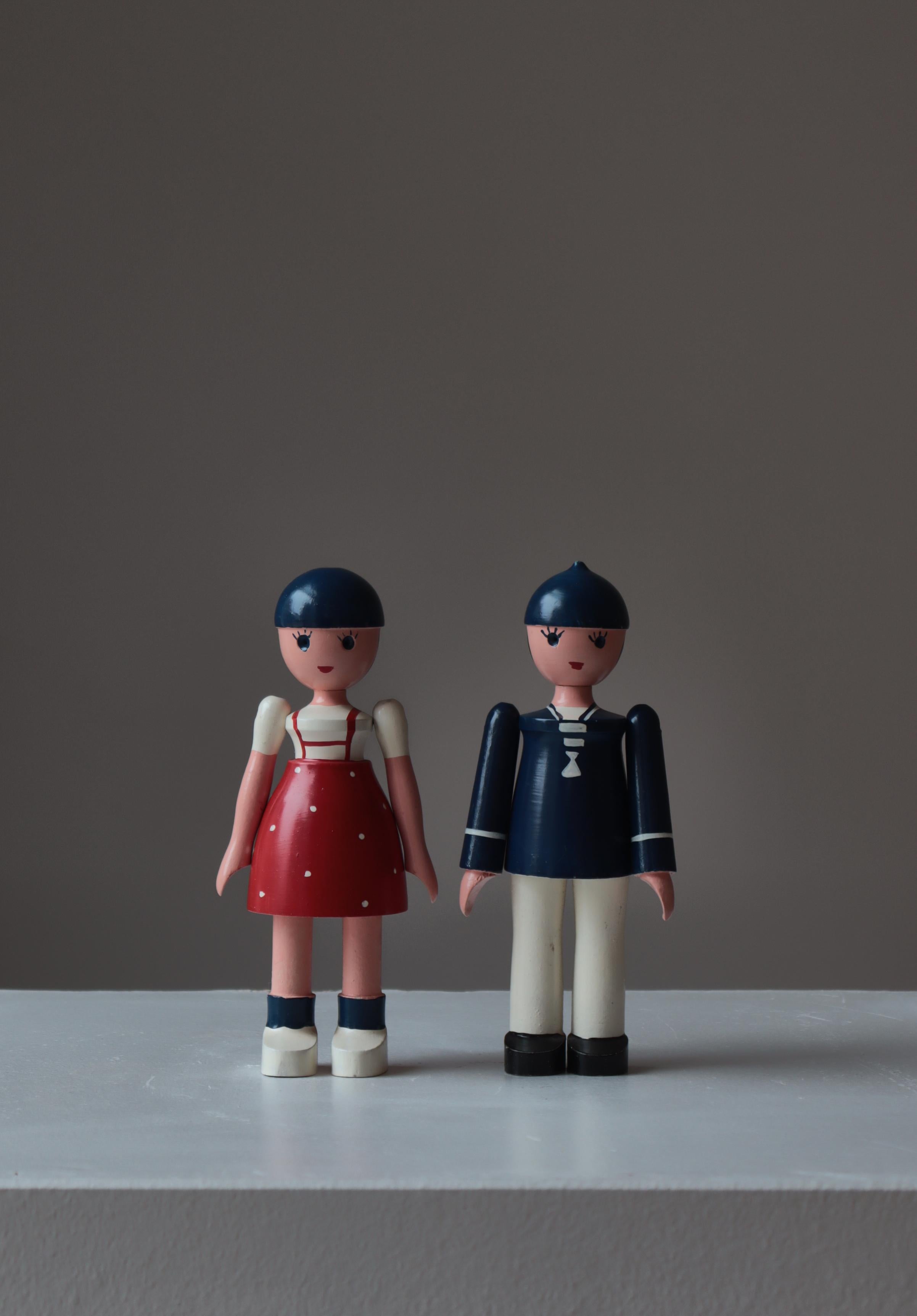 Rare and charming set of wooden dolls by Kay Bojensen from his own workshop. The dolls were designed in the 1930s and was named Lise (female) and Ole (male) as these were the most common names for girls and boys in Denmark at the time. Both dolls