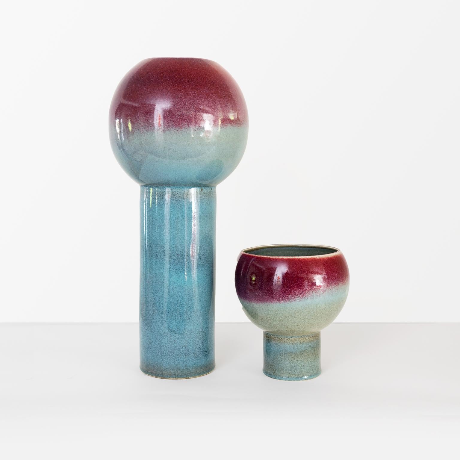 Two large midcentury Swedish vases circa 1960 from Rörstrand. These are attributed to Inger Persson but not signed by her. 

Left: Height 25”, diameter 11”

Right: Height 10”, diameter 9”.