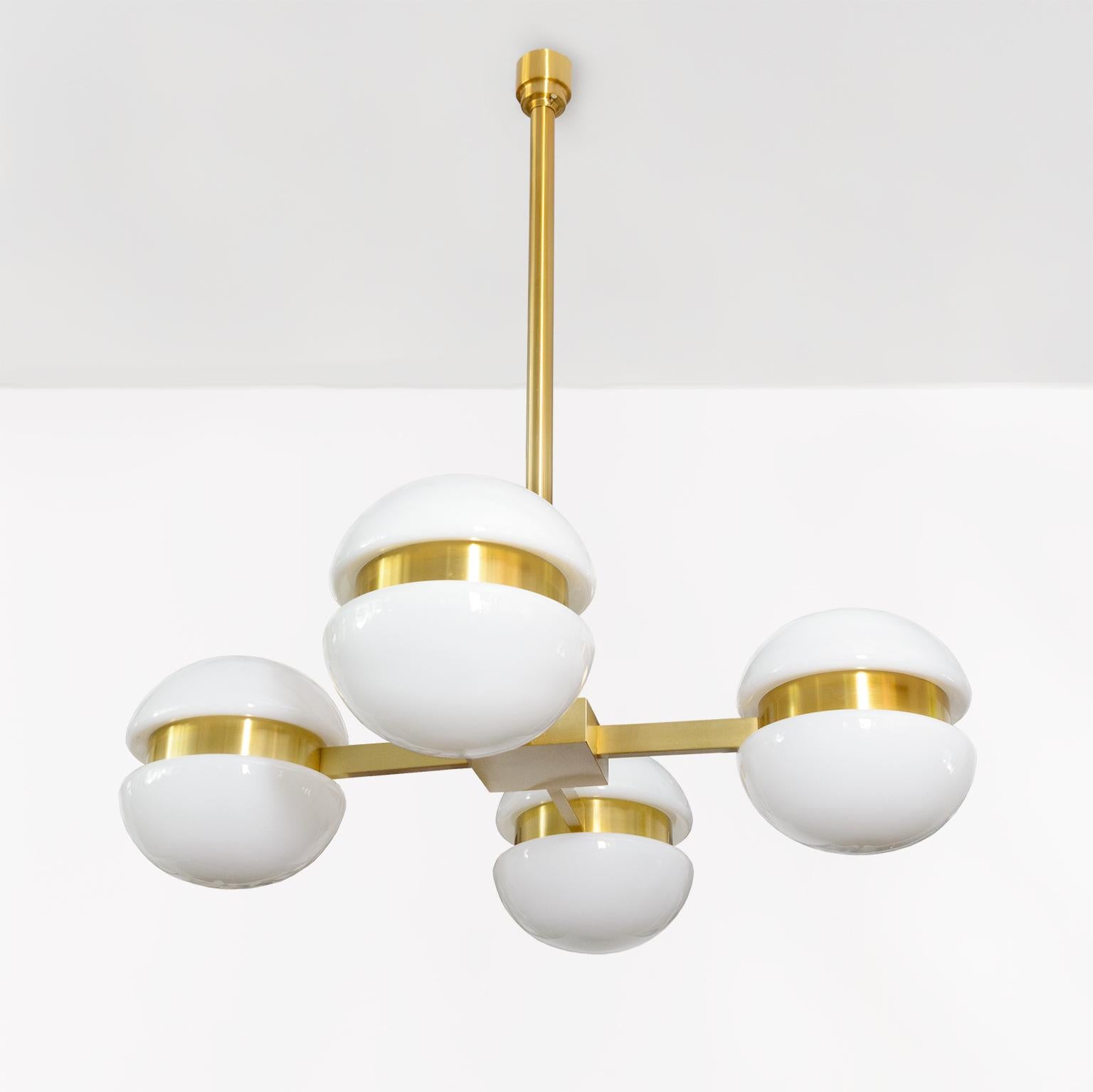 Scandinavian Modern, large Heikki Turunen designed Finnish chandelier, by Ker-Lux, 1970's. Frame with four arms made of anodized aluminum with opal glass shades. Made by Ker-Lux Finland in the 1970’s. Rewired for use in the USA.

Measures: Height