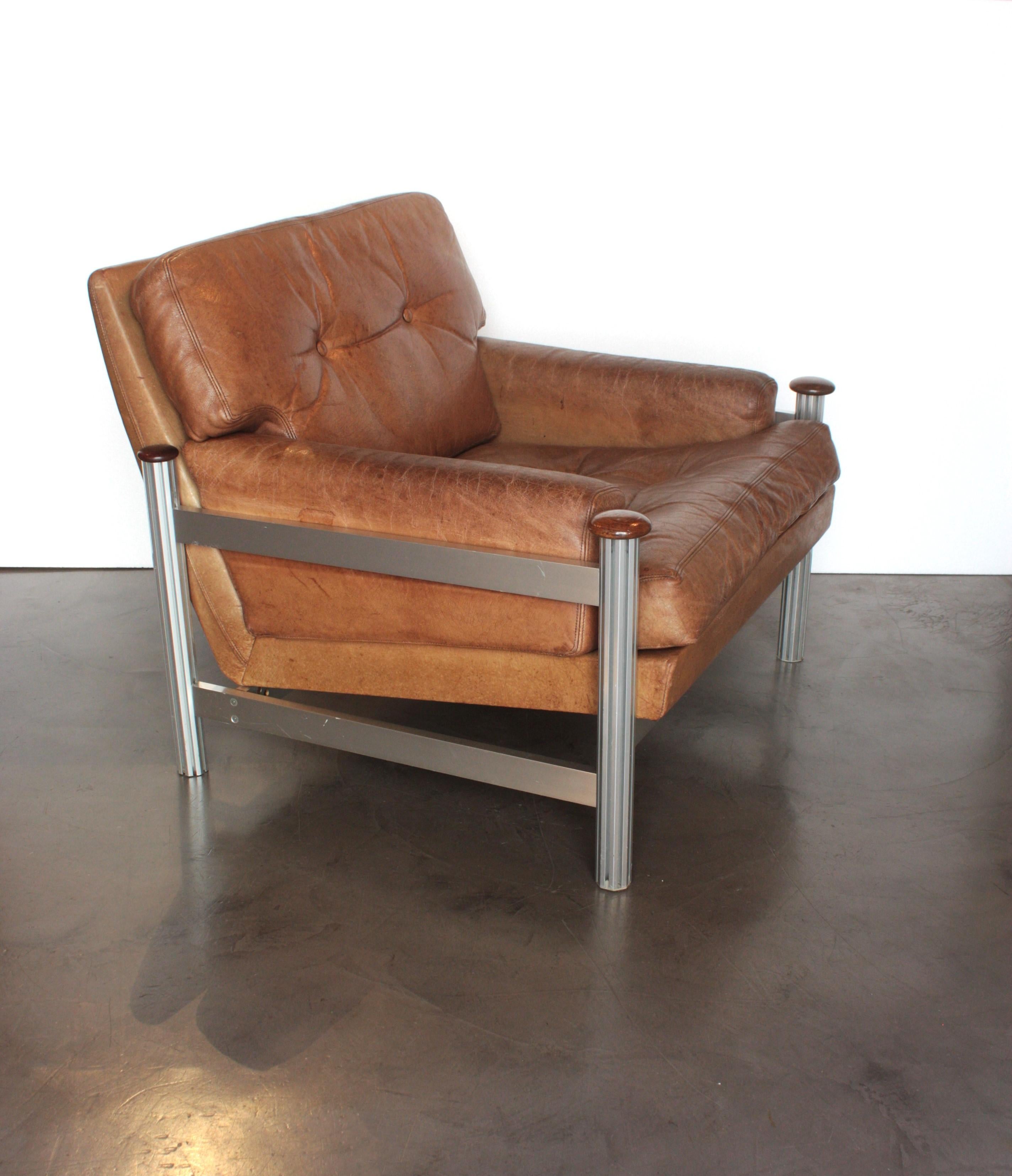 20th Century Scandinavian Modern Leather and Aluminium Lounge Chair For Sale