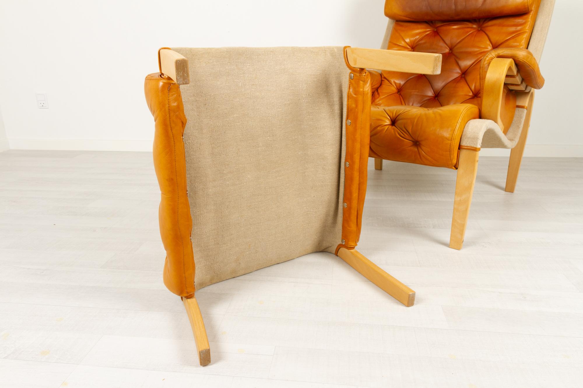 Scandinavian Modern Lounge Chair and Stool by Nielaus & Jeki Møbler, 1980s 11