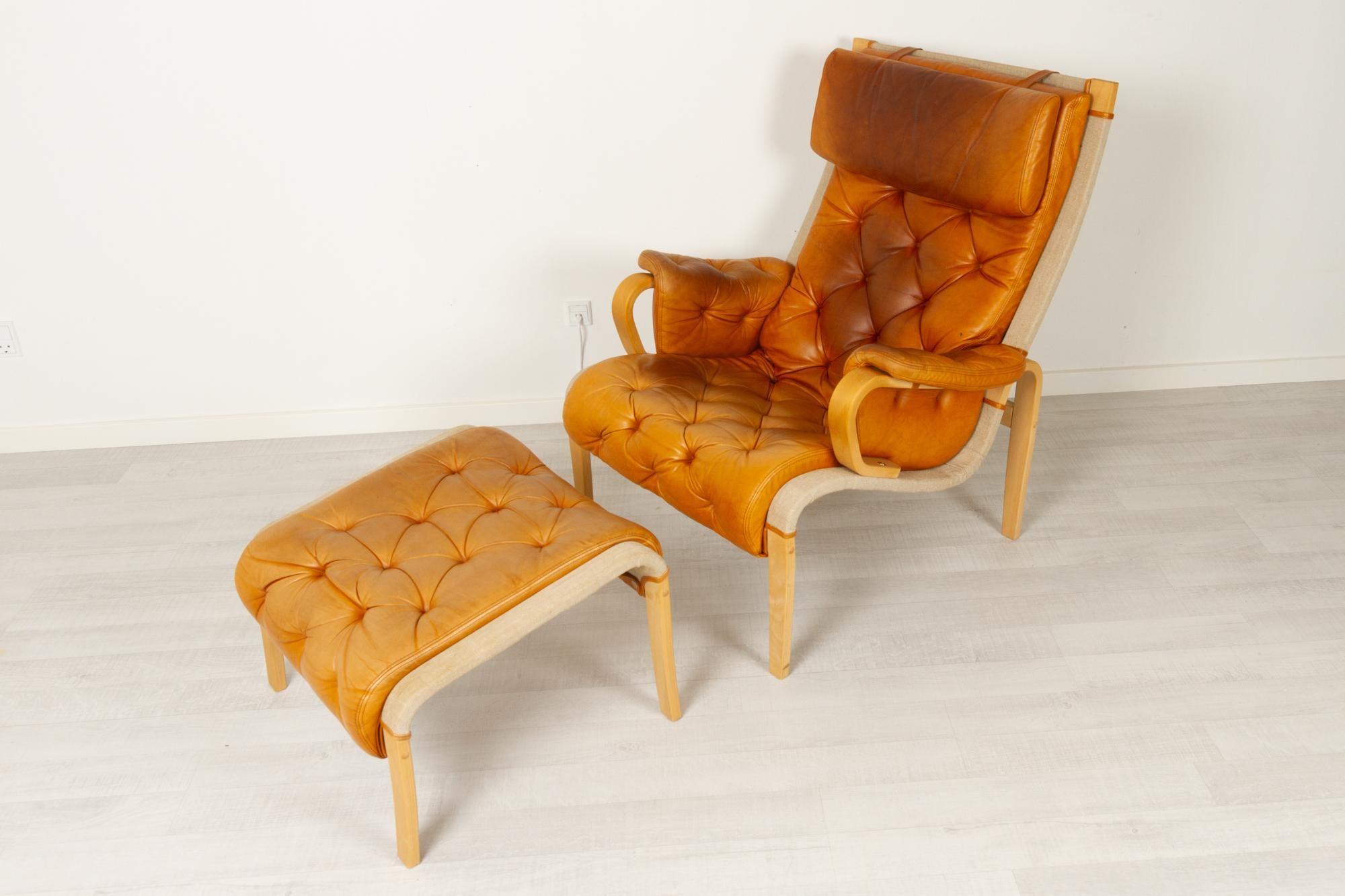Late 20th Century Scandinavian Modern Lounge Chair and Stool by Nielaus & Jeki Møbler, 1980s