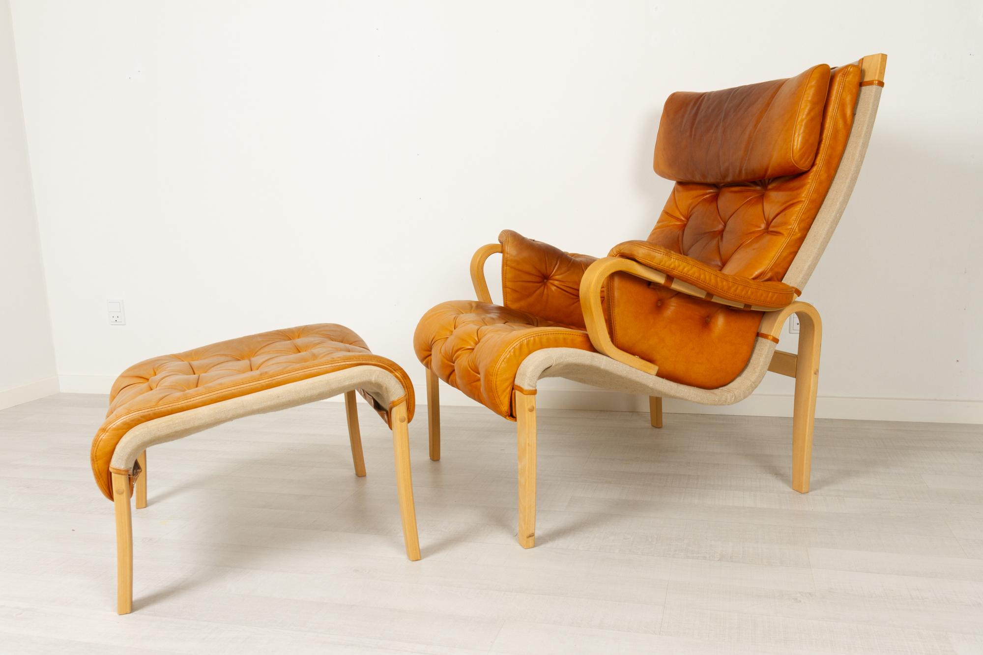 Leather Scandinavian Modern Lounge Chair and Stool by Nielaus & Jeki Møbler, 1980s