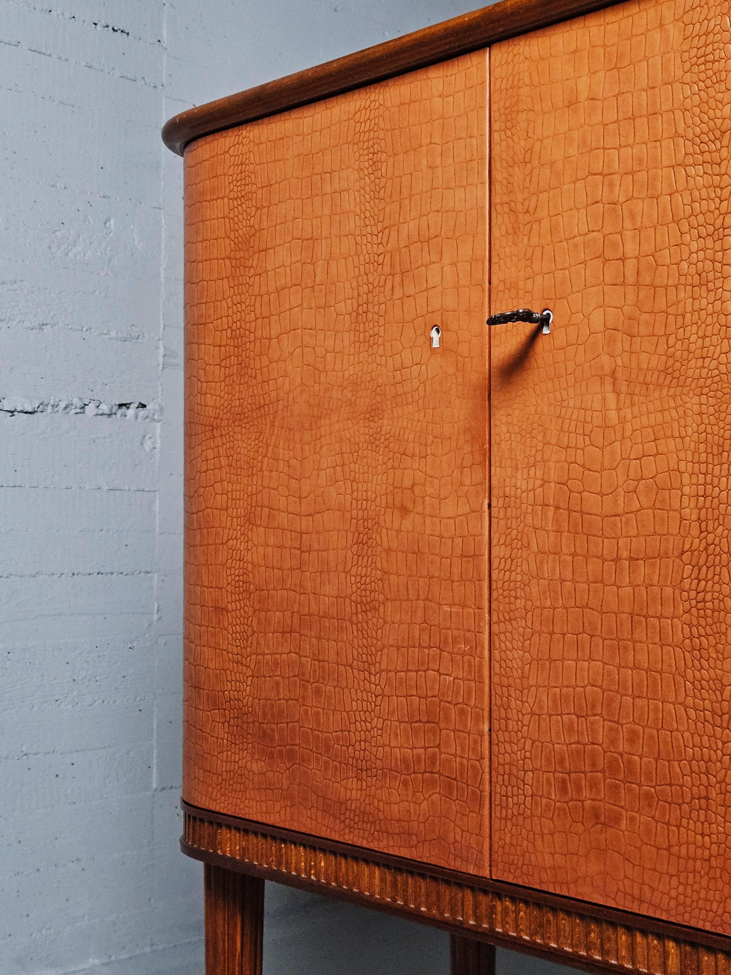 Swedish Scandinavian modern mahogany and leather bar cabinet, Sweden, 1950s