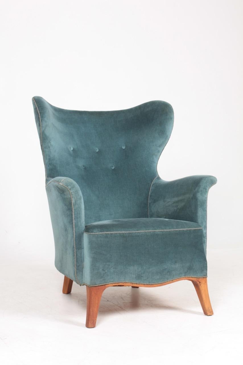 Midcentury lounge chair upholstered in French velvet. Designed by Gunnel Nyman in 1941. Made in Denmark.