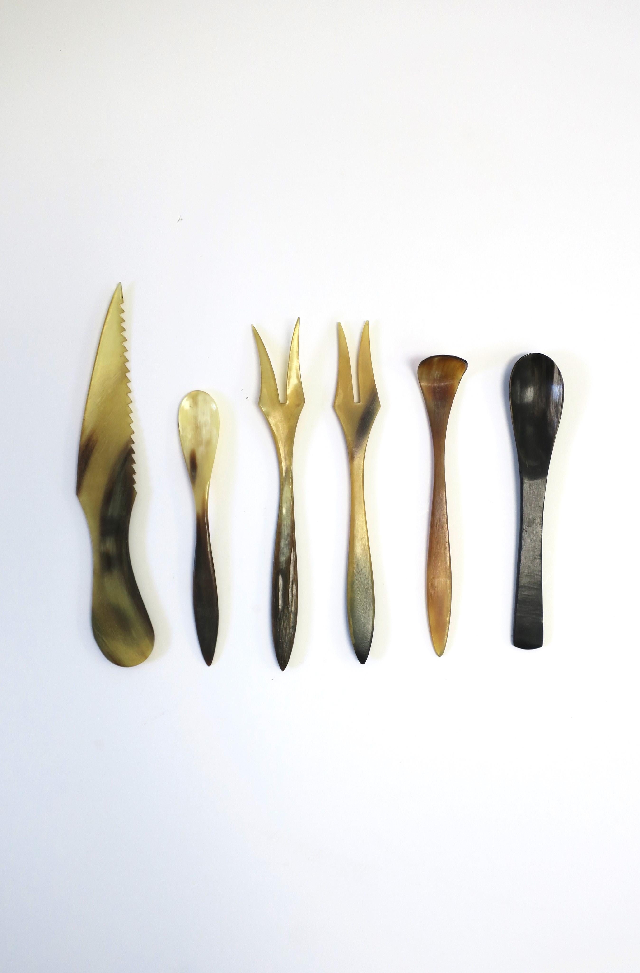 A set of six (6) Scandinavian Modern Minimalist horn appetizer utensils, circa late-20th century, Denmark. A great set for everyday use or entertaining. 

Dimensions: 
Largest is serrated knife on left measuring 1