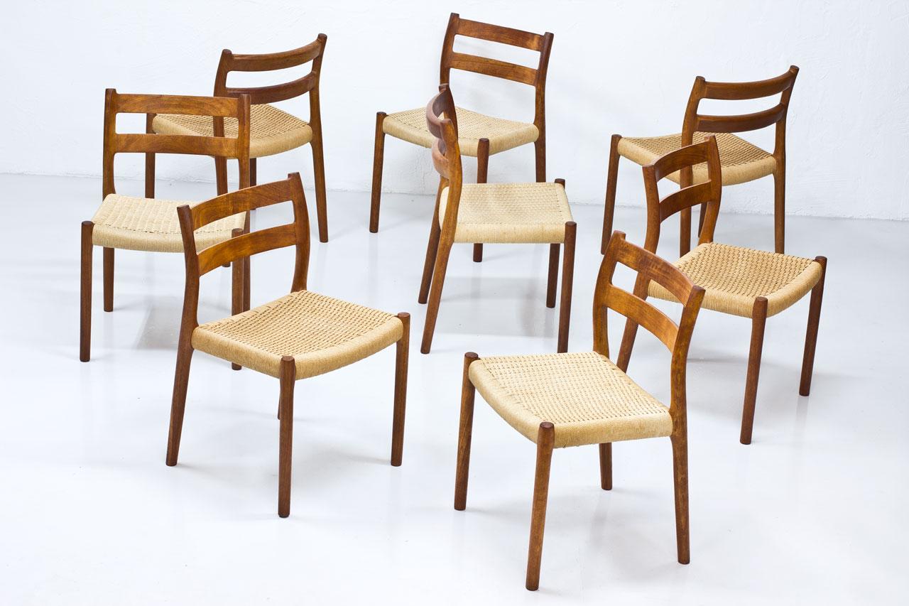 Set of 8 “Model 84? dining chairs designed by Niels Otto Møller, manufactured by J.L. Møllers Møbelfabrik in Denmark during the 1960s. Solid teak frame with paper cord seat.