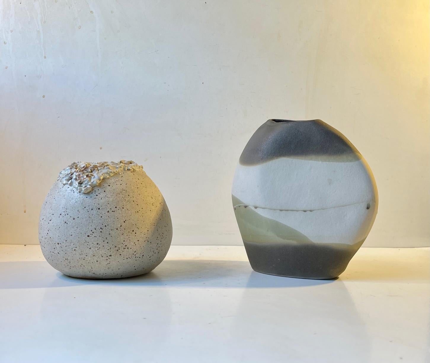 A curated set of morphic resonance vases. One that tries to mimic the human vulva and one with a more geological approach mimicking the asymmetrical qualities and texture of a rock/stone. Both pieces were studio made by unidentified Scandinavian
