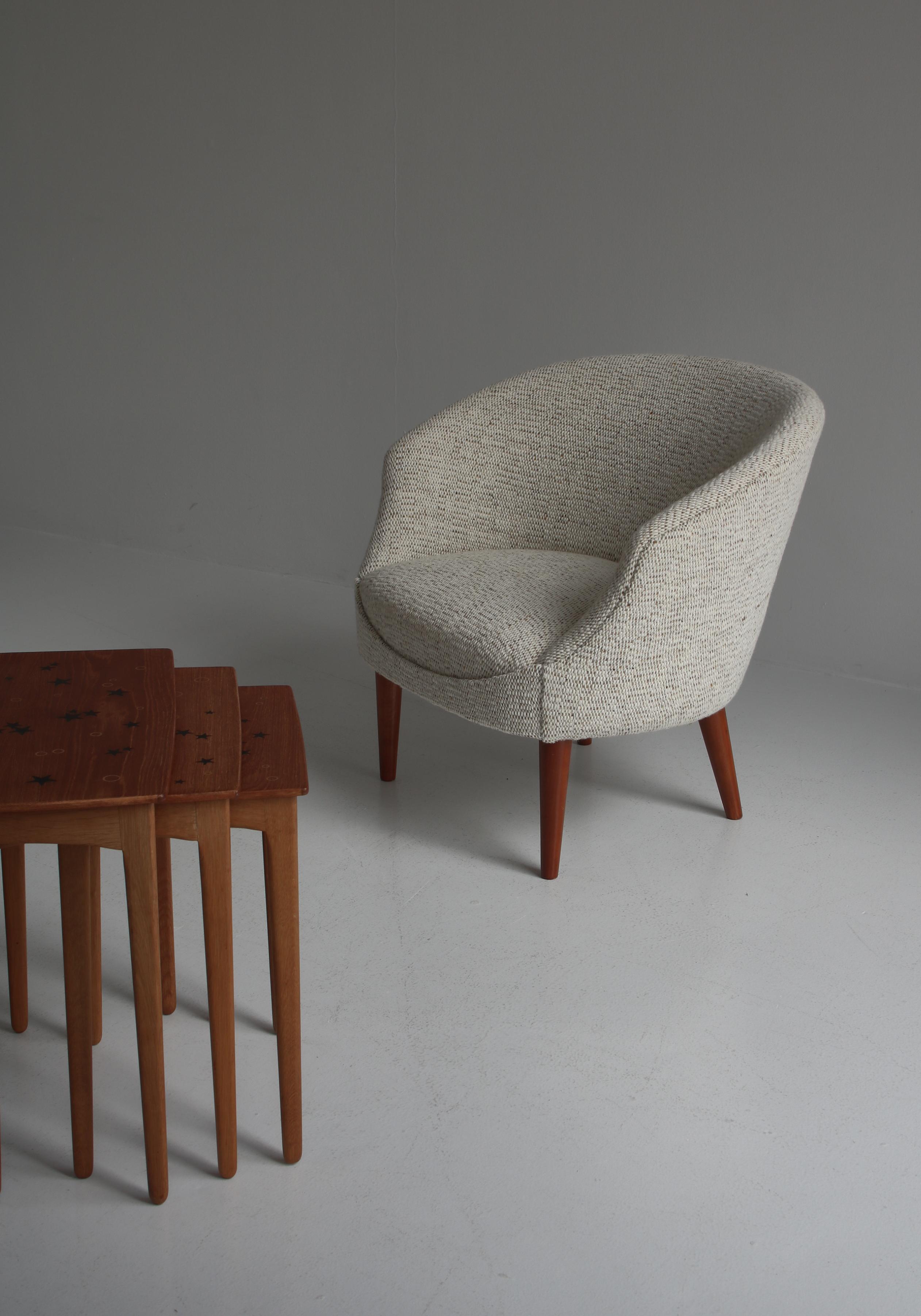 Rare set of beautiful nesting tables designed by Svend Aage Madsen and produced by Sigurd Hansen Møbelfabrik in Denmark in the 1950s. Teak wood with stylish inlays of stars and circles.