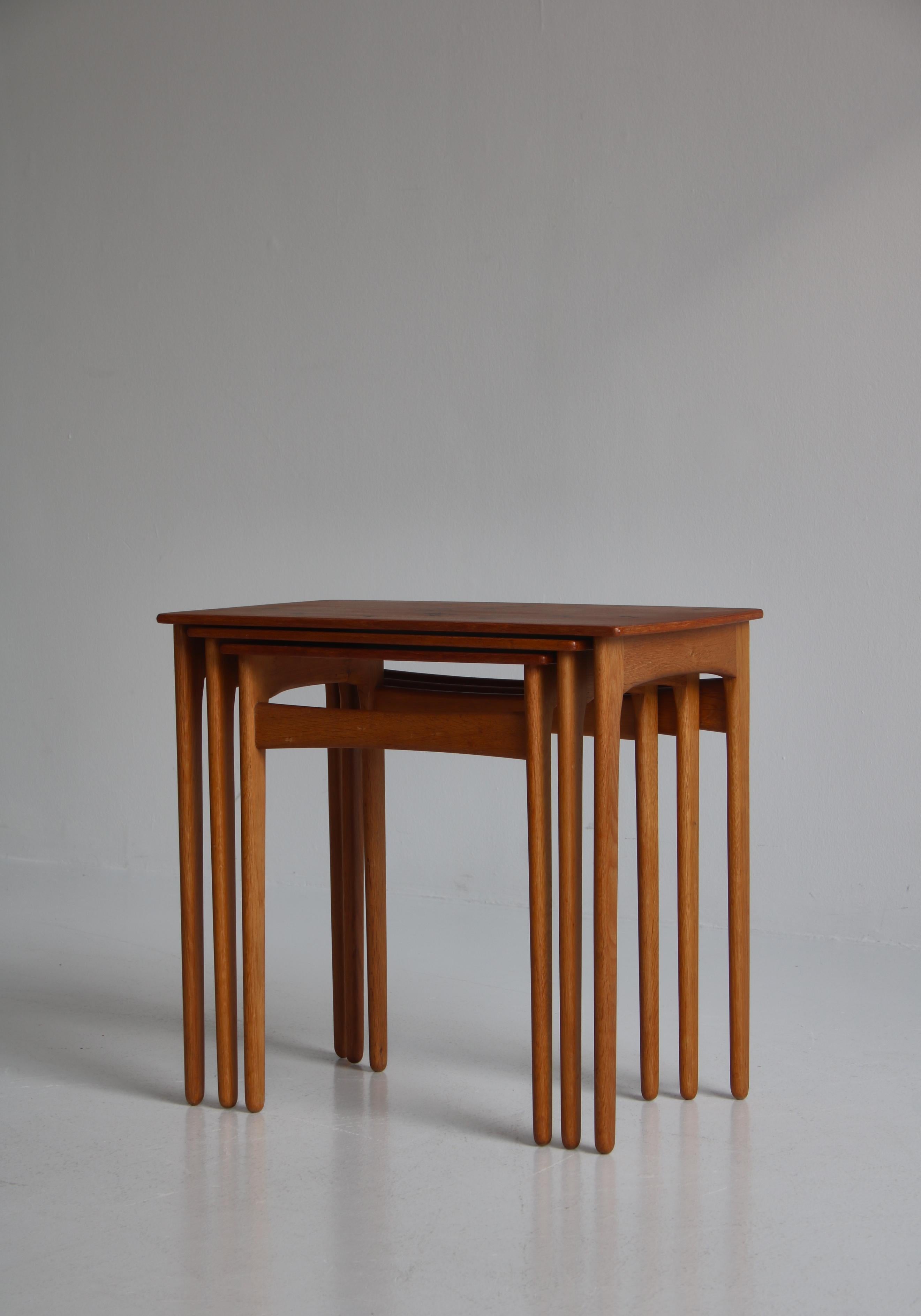 Danish Nesting Tables in Teak and oak by Svend Aage Madsen, Denmark, 1950s For Sale
