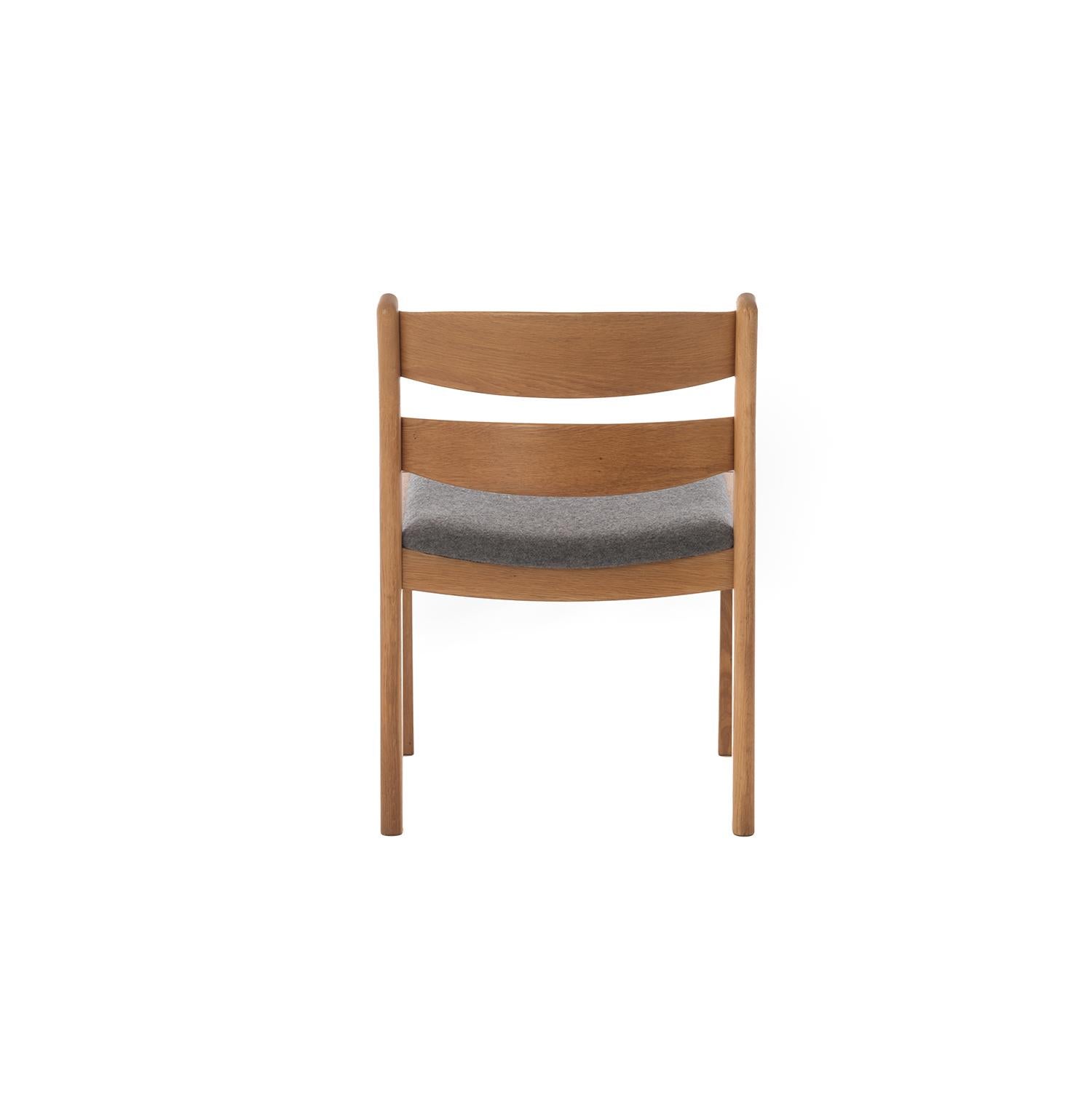 Scandinavian Modern Oak Dining Chairs with Boiled Wool Seats by Kurt Ostervig 1