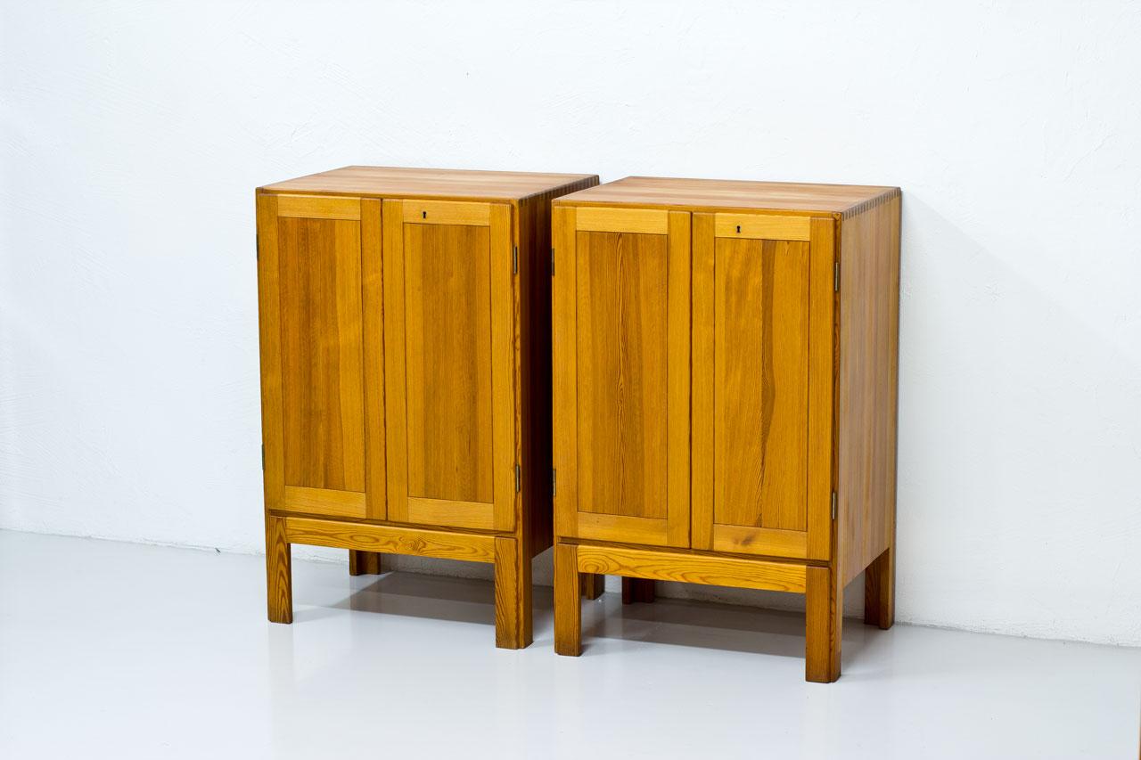 Rare pair of cabinets designed by Børge Mogensen, manufactured by Karl Andersson & Söner in Sweden during the 1960s. Made from Oregon Pine. Inside with grey lacquered shelves & drawers.
