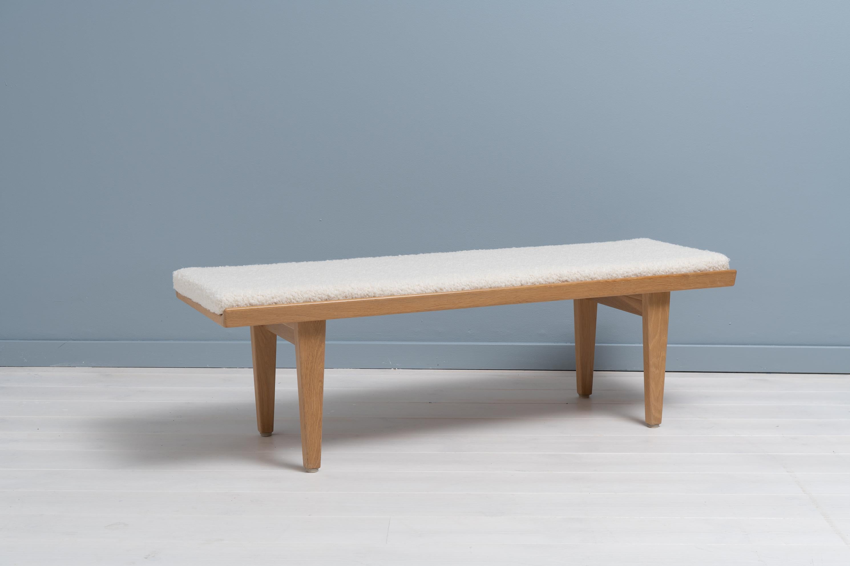 Scandinavian modern Öresund design bench by Børge Mogensen for Karl Andersson & Söner. The bench is from the 1960s and made in light oak. Good vintage condition consistent with age and use. The bench is a humble designer furniture from one of the
