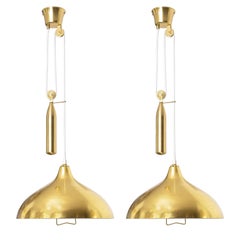 Scandinavian Modern Pair of Itsu Polished Brass Counterweight Pendants