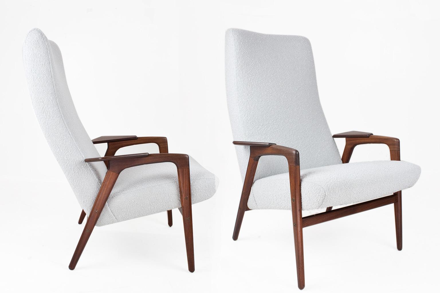 Pair of high back armchairs, model Ruster or Mingo, in teak with a new light grey upholstery (fabric and fillings). This Ekstrom Design has a high back with elegant flared armrests. The frame is solid teak and in very good condition. 

This lounge