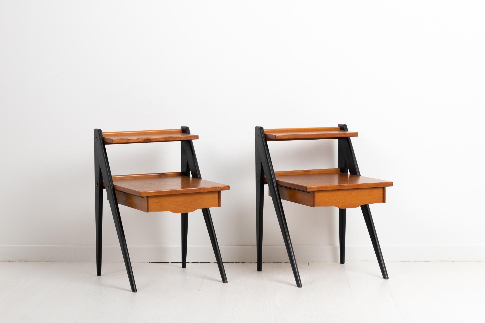 Scandinavian modern nightstands in teak with blackened legs designed by Yngve Ekström. The nightstands are from Sweden and made during the 1960s. Good vintage condition consistent with age and use. They have smaller traces of wear.