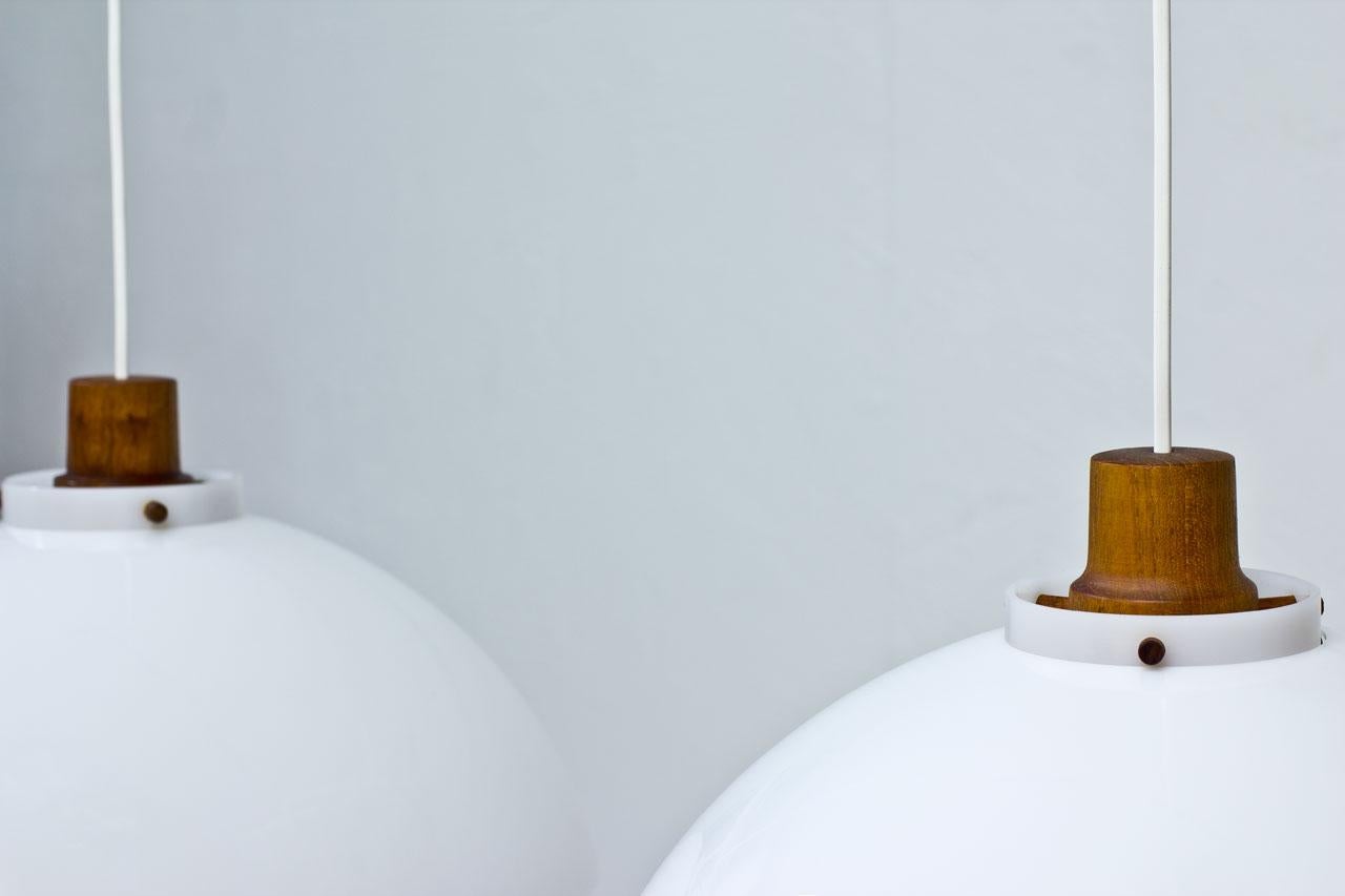 Mid-20th Century Scandinavian Modern Pendant Lamps in Teak and Acrylic by Luxus, Sweden, 1950s