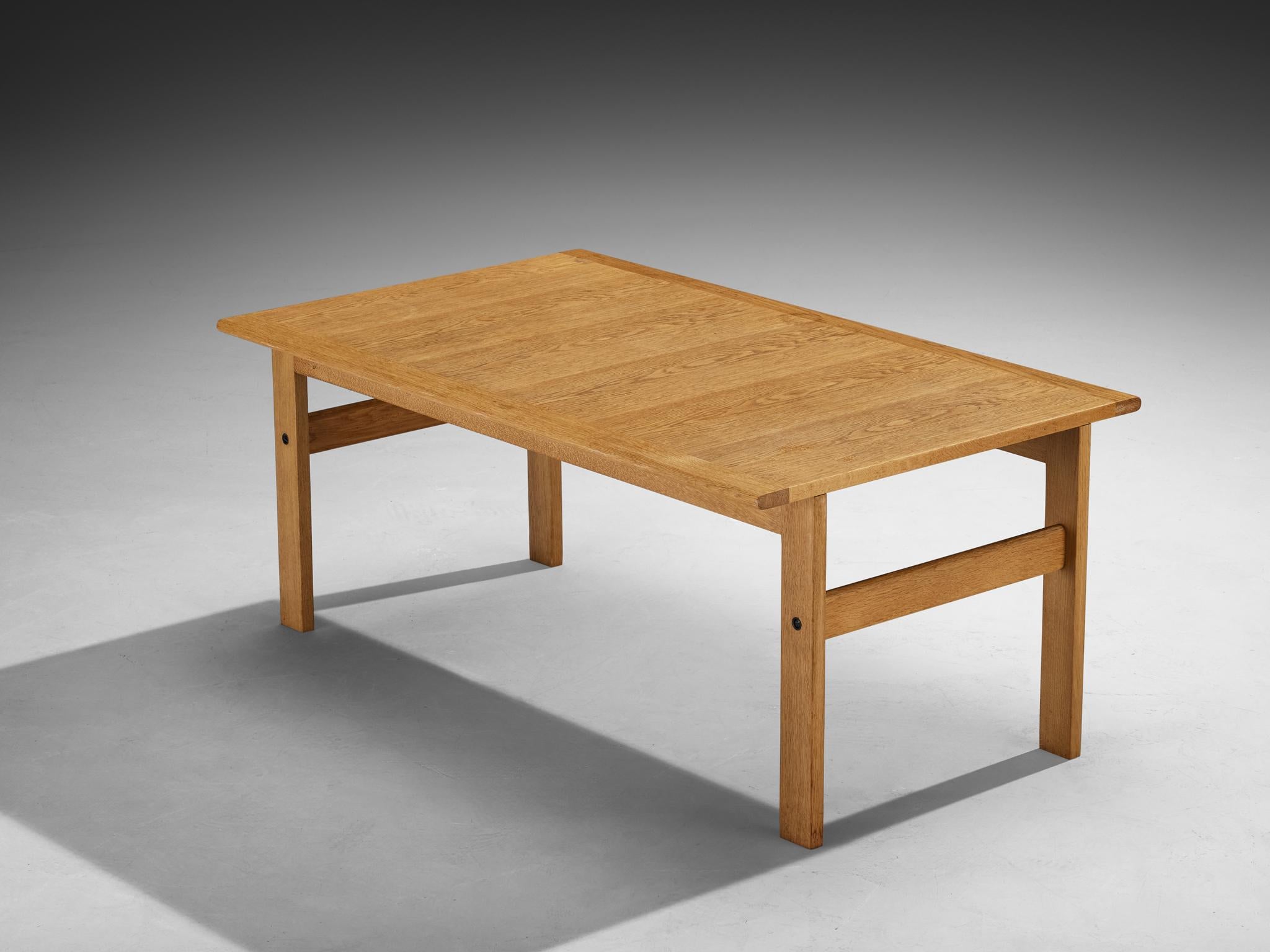 Coffee table, oak, Scandinavia, 1960s

This simplistic coffee table is crafted from oak, dating back to the 1960s. The design showcases clean lines and minimalist elegance, characteristic of Scandinavian modernism. The rich oak wood features a warm