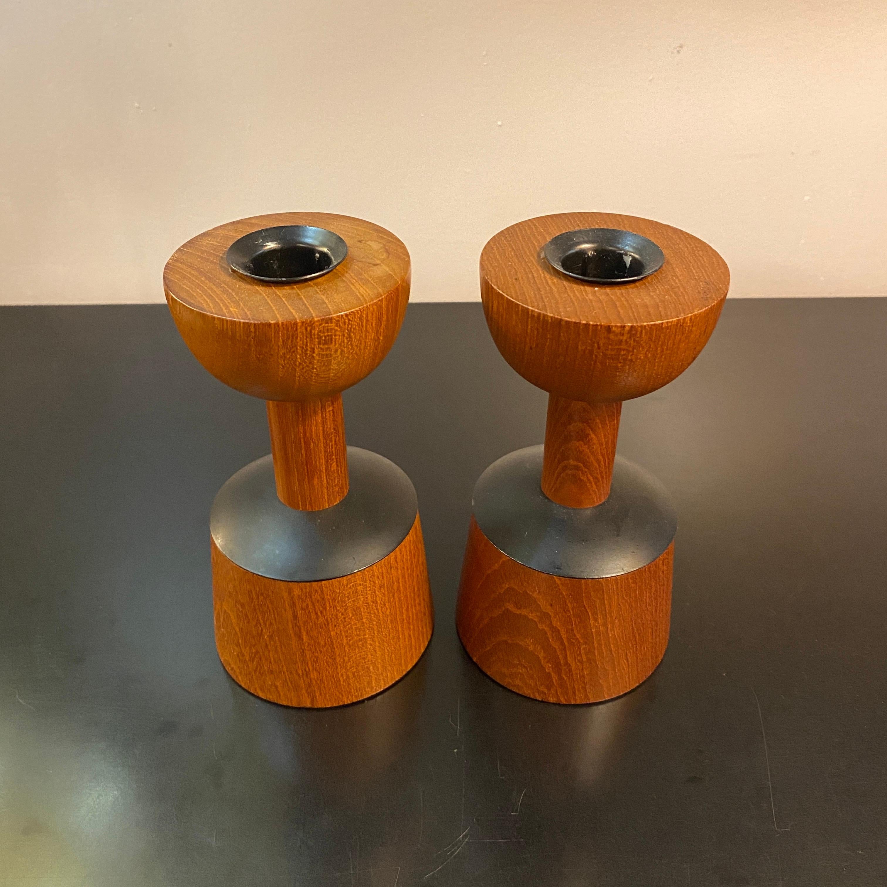 Pair of chic, Scandinavian modern, rosewood candleholders by Laurids Lonborg feature lovely tapered silhouettes with blackened metal accents. 