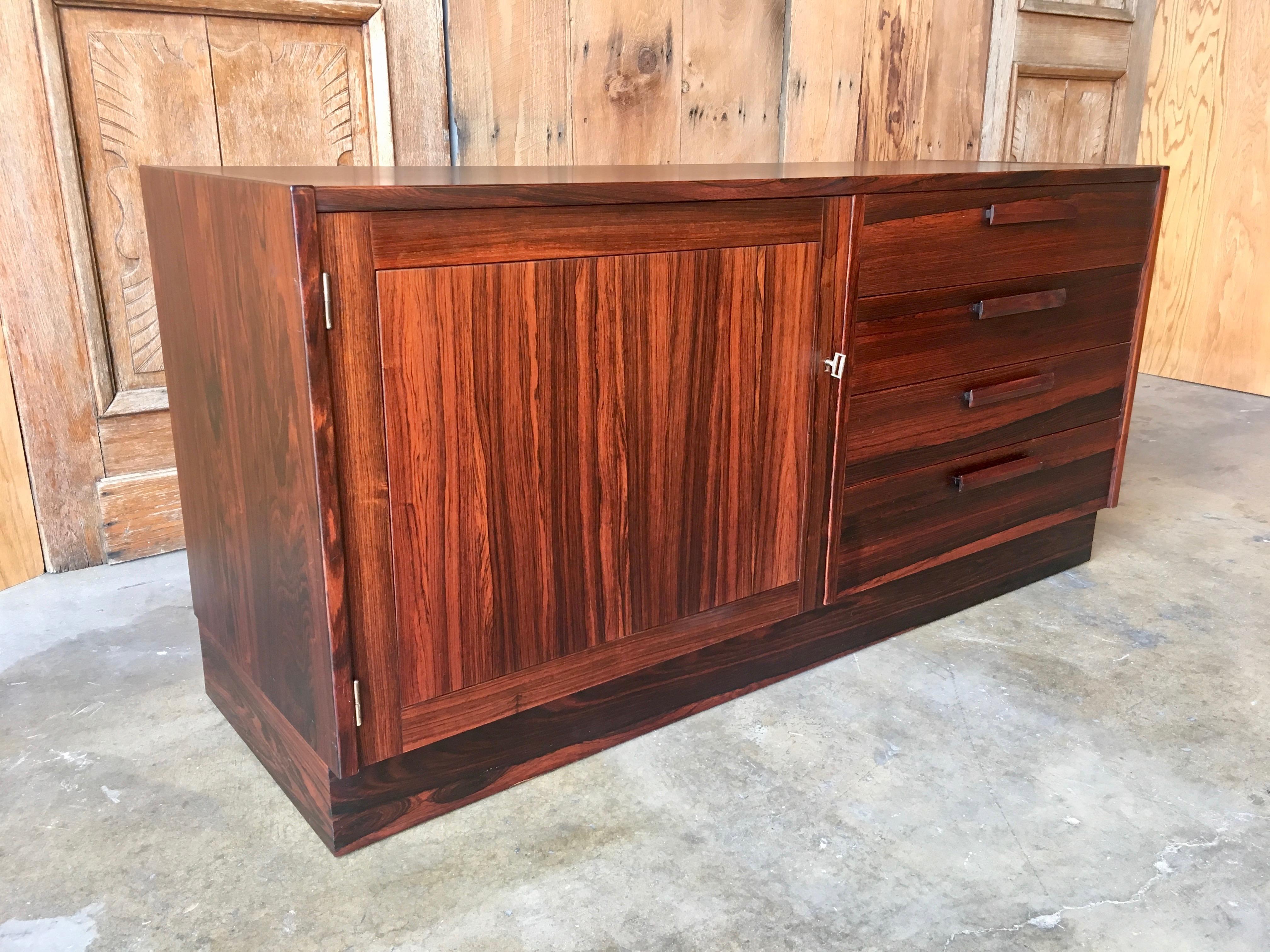 Petite low rosewood credenza made by Troeds Bjarnum of Sweden.