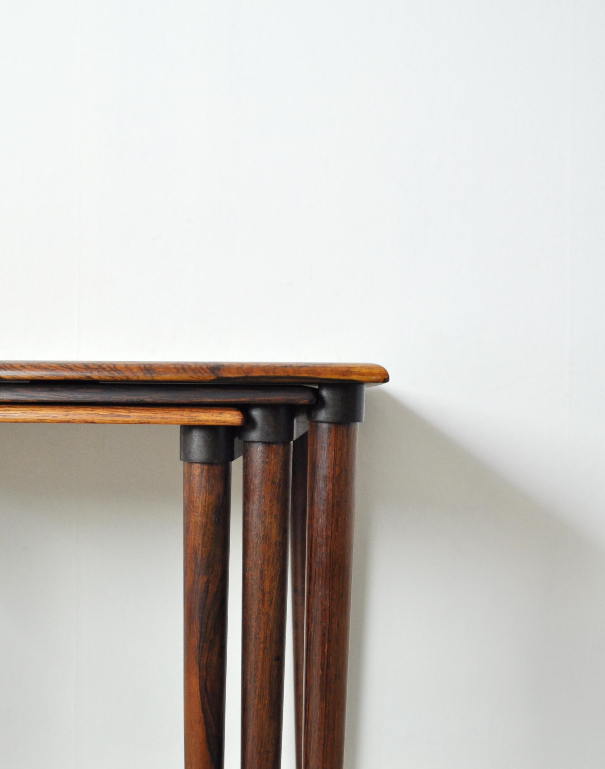 20th Century Scandinavian Modern Rosewood Nesting Tables with Drumstick Legs For Sale