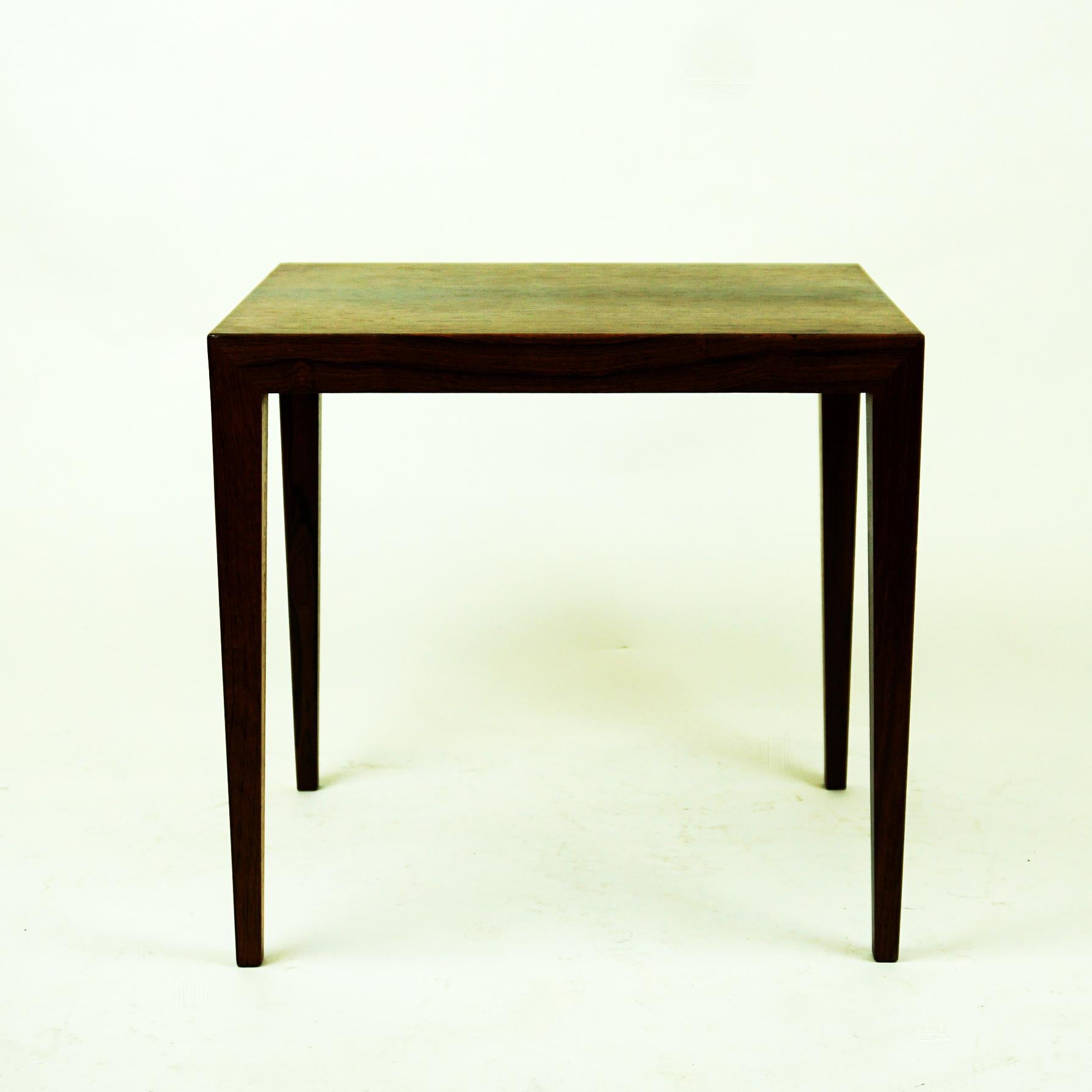 Small charming Danish 1960s rosewood side table with beautiful handcrafted details designed by Severin Hansen for Haslev Mobelsnedkeri. Pure and elegant shape with beautiful grained wood.