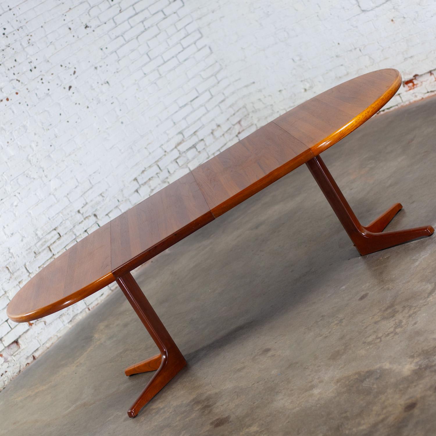 Danish Scandinavian Modern Round to Oval Teak Expanding Dining Table Attr Gudme Mobel. For Sale