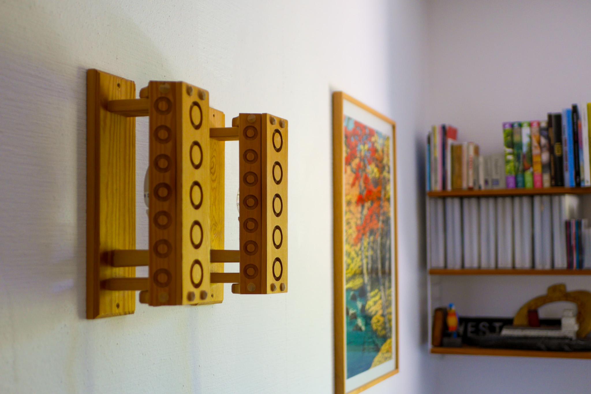 Swedish Scandinavian modern sconces. A pair of Mid-century modern Pine wood wall lights For Sale