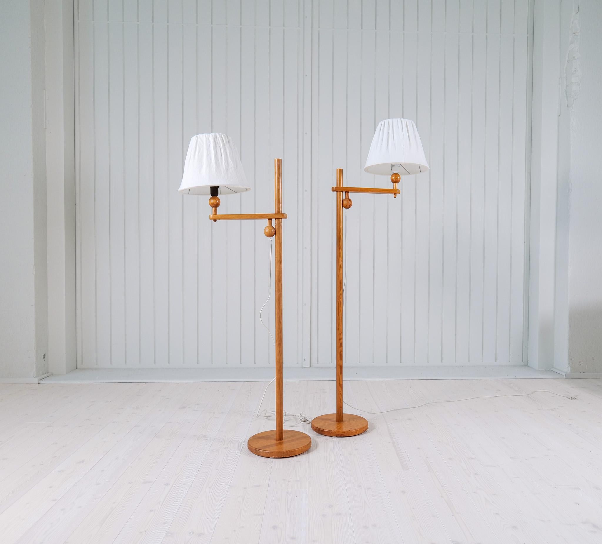 Floor lamps manufactured in Sweden. It’s made in solid pine. These ones with organically sculptured pine that gives a wonderful floor lamp. 

Nice vintage condition, small marks, and wear original shades with some wear.

Dimensions: Height 140cm,