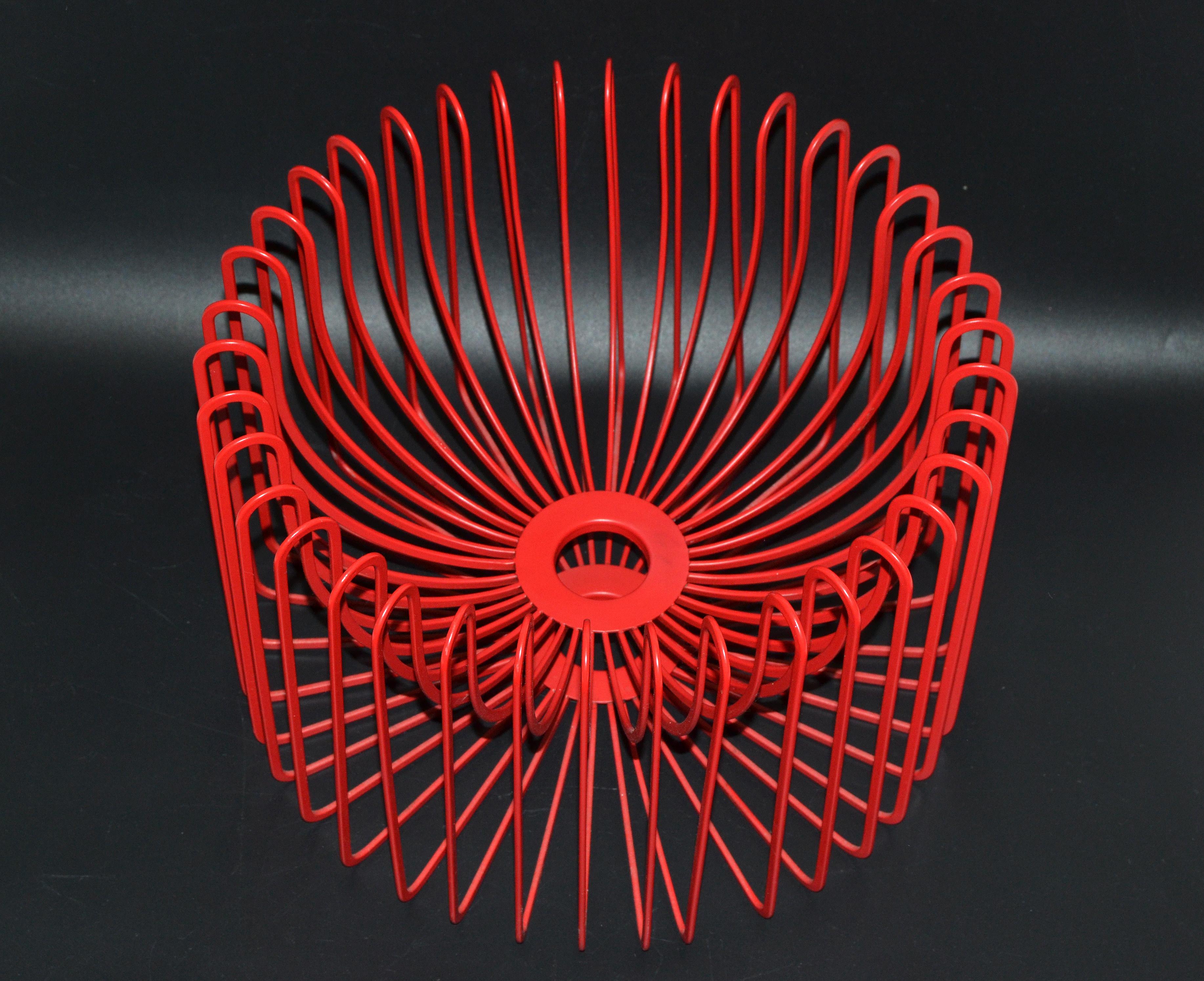 Scandinavian modern sculptural red metal bowl, made in Sweden in the 1980s.
This bowl is made out of one piece of metal stunning craftsmanship.
The sculptural bowl serves as an artistic and modern centerpiece for any table.


